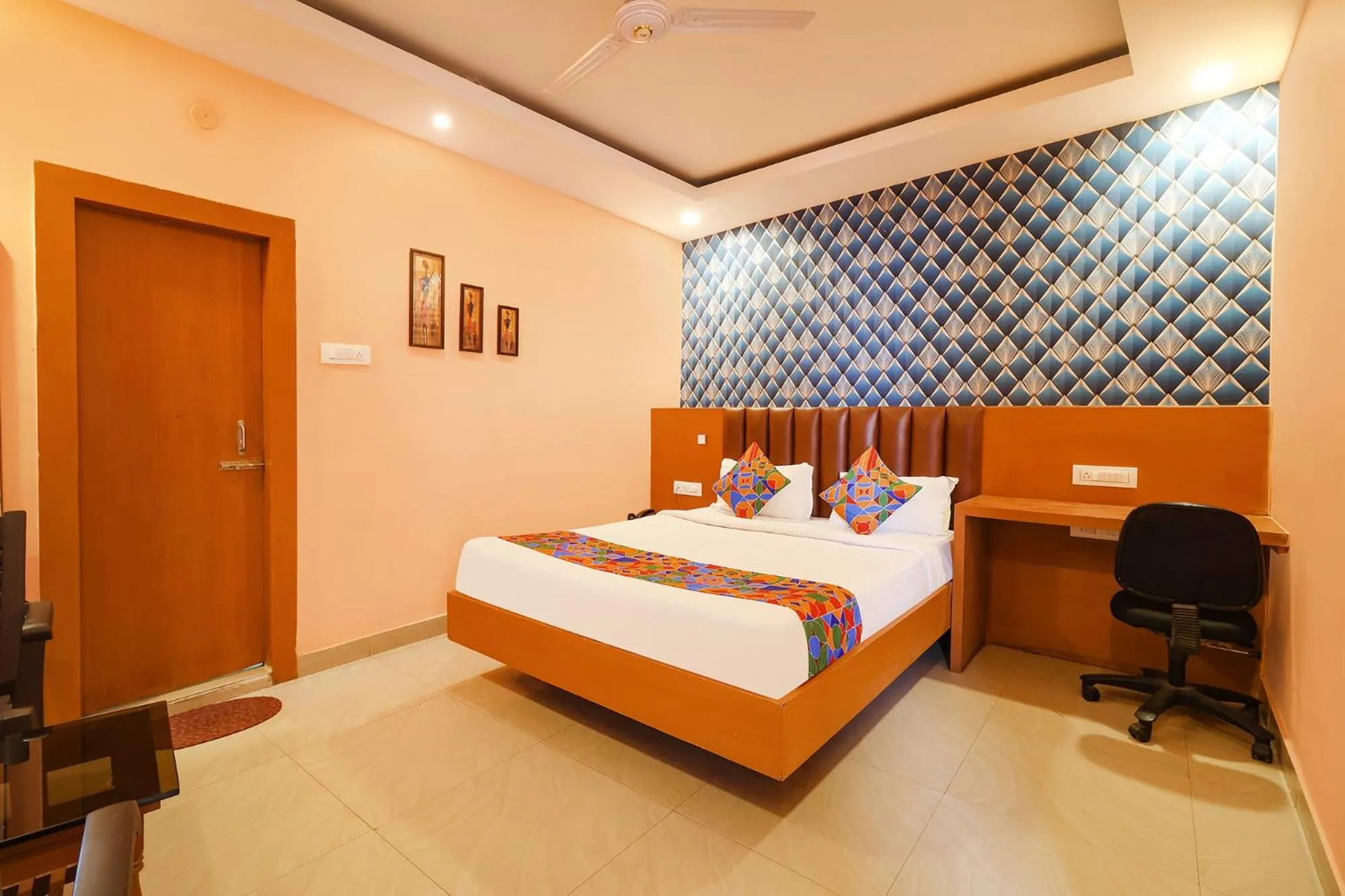 Bed in FabHotel Shanti International