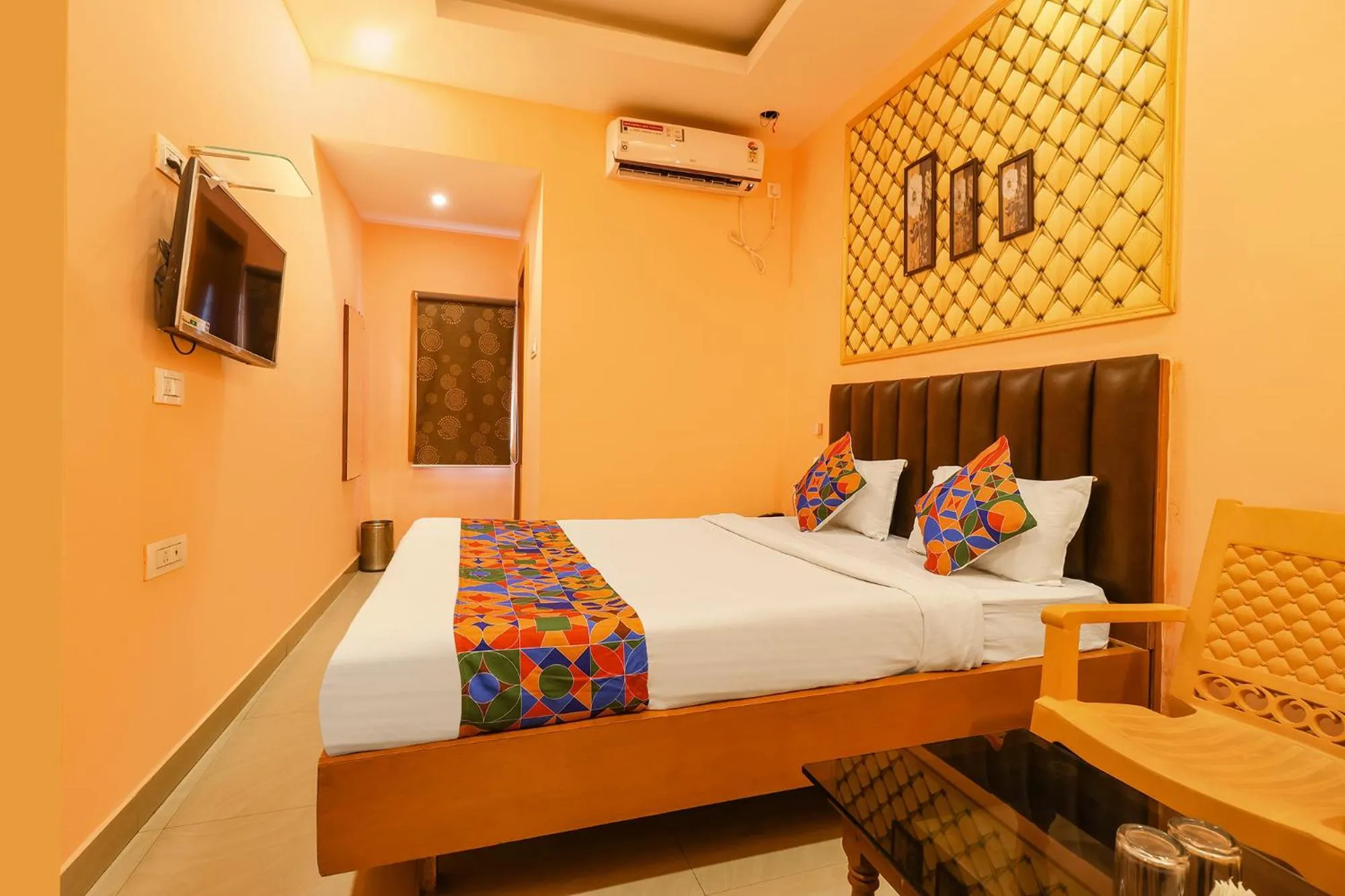 Bed in FabHotel Shanti International