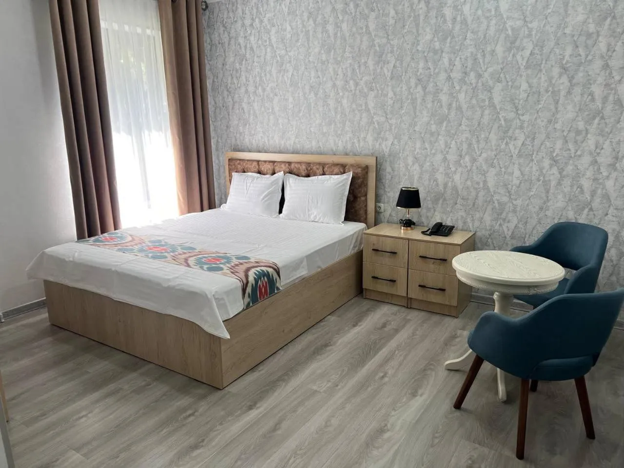 Bed in DSF GARDEN HOTEL