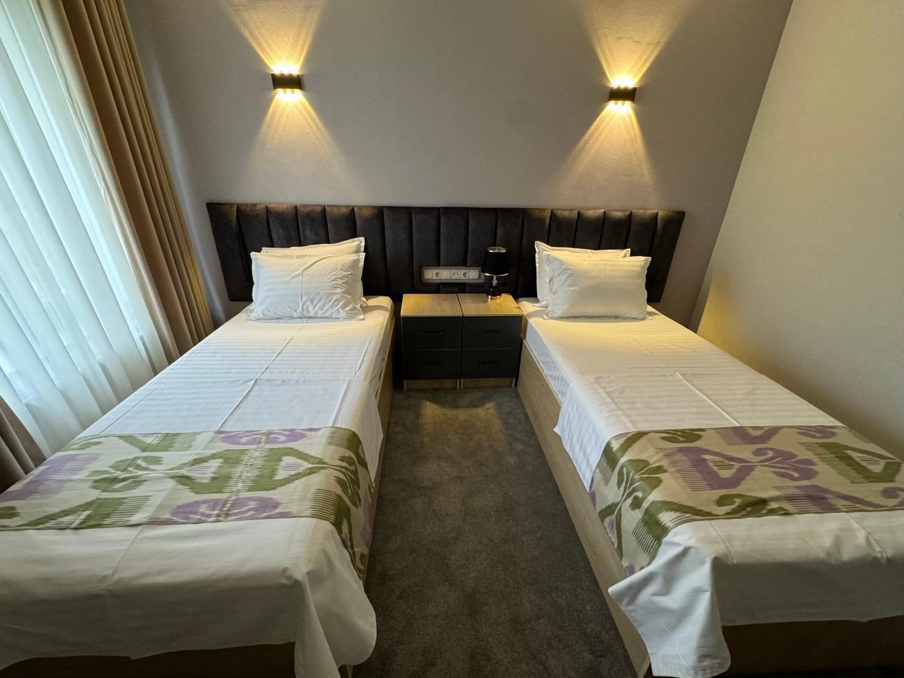 Bed in DSF GARDEN HOTEL