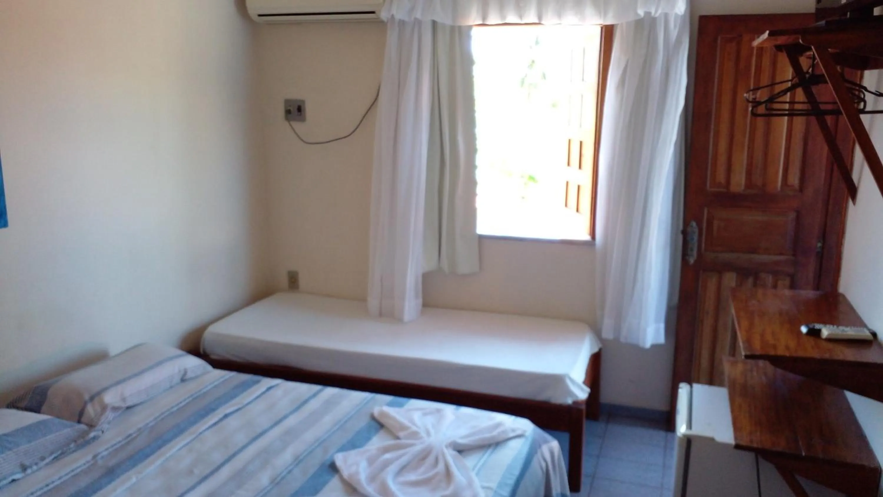 Bed in Pousada da Ale