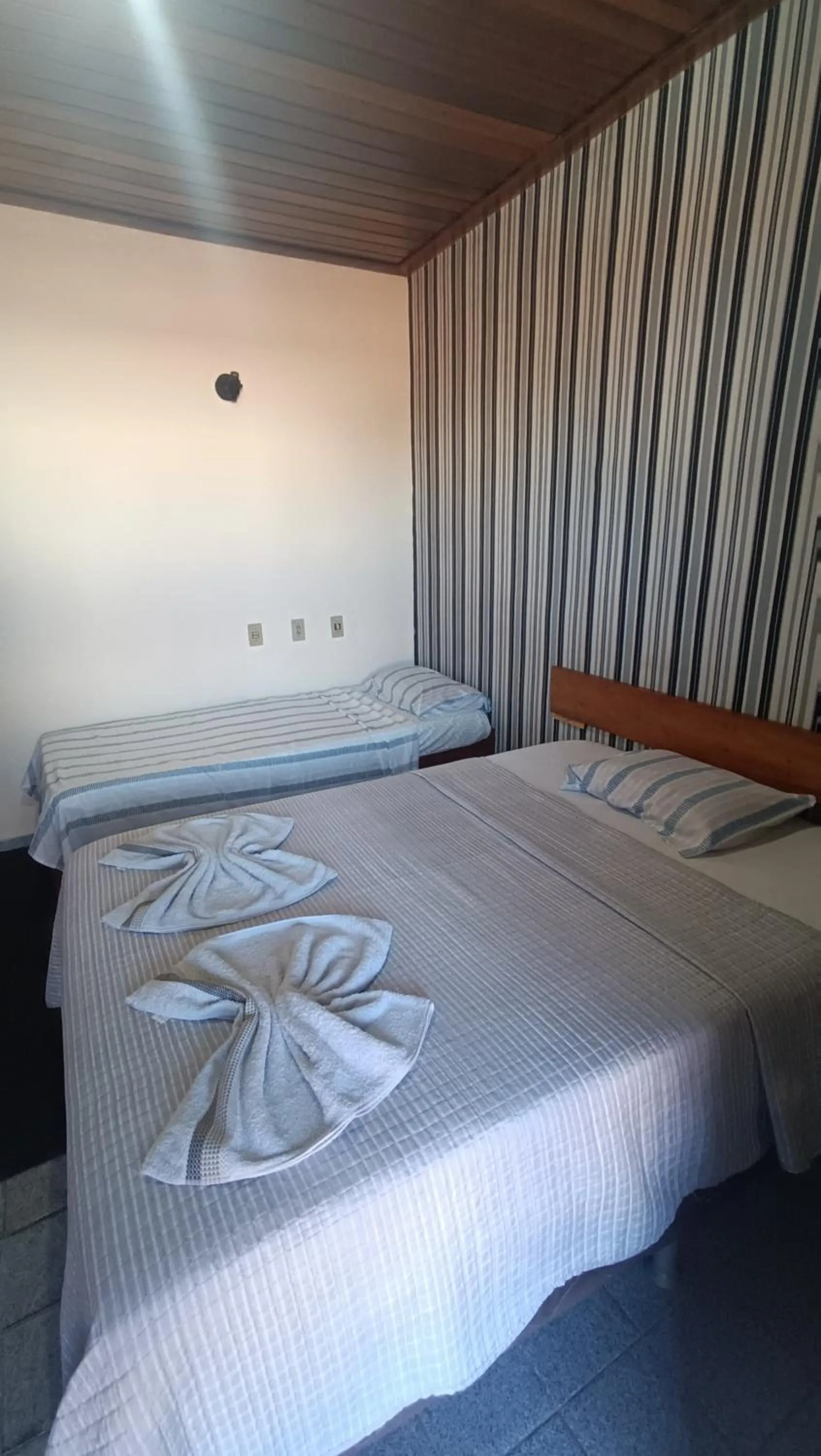 Bed in Pousada da Ale