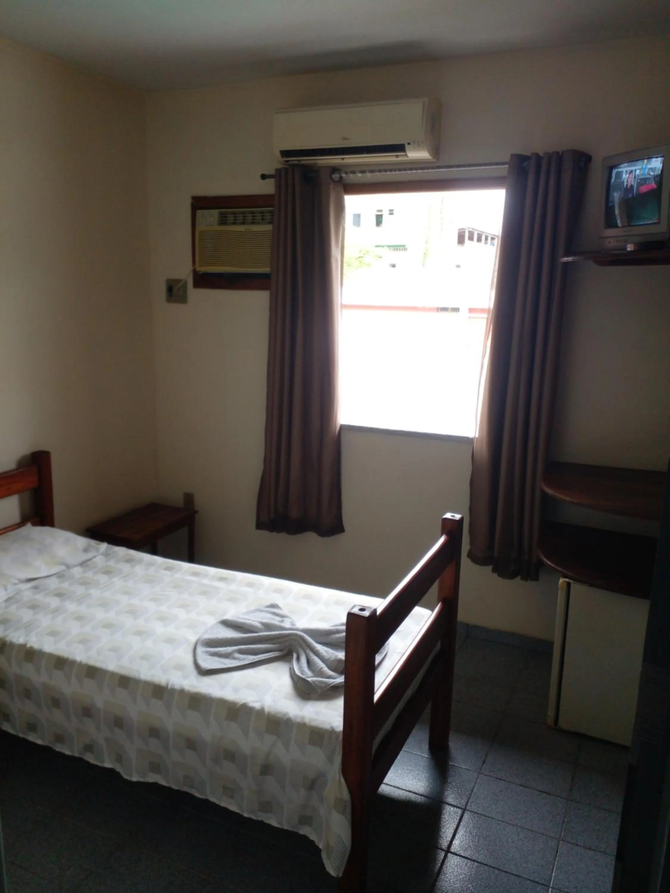 Bed in Pousada da Ale