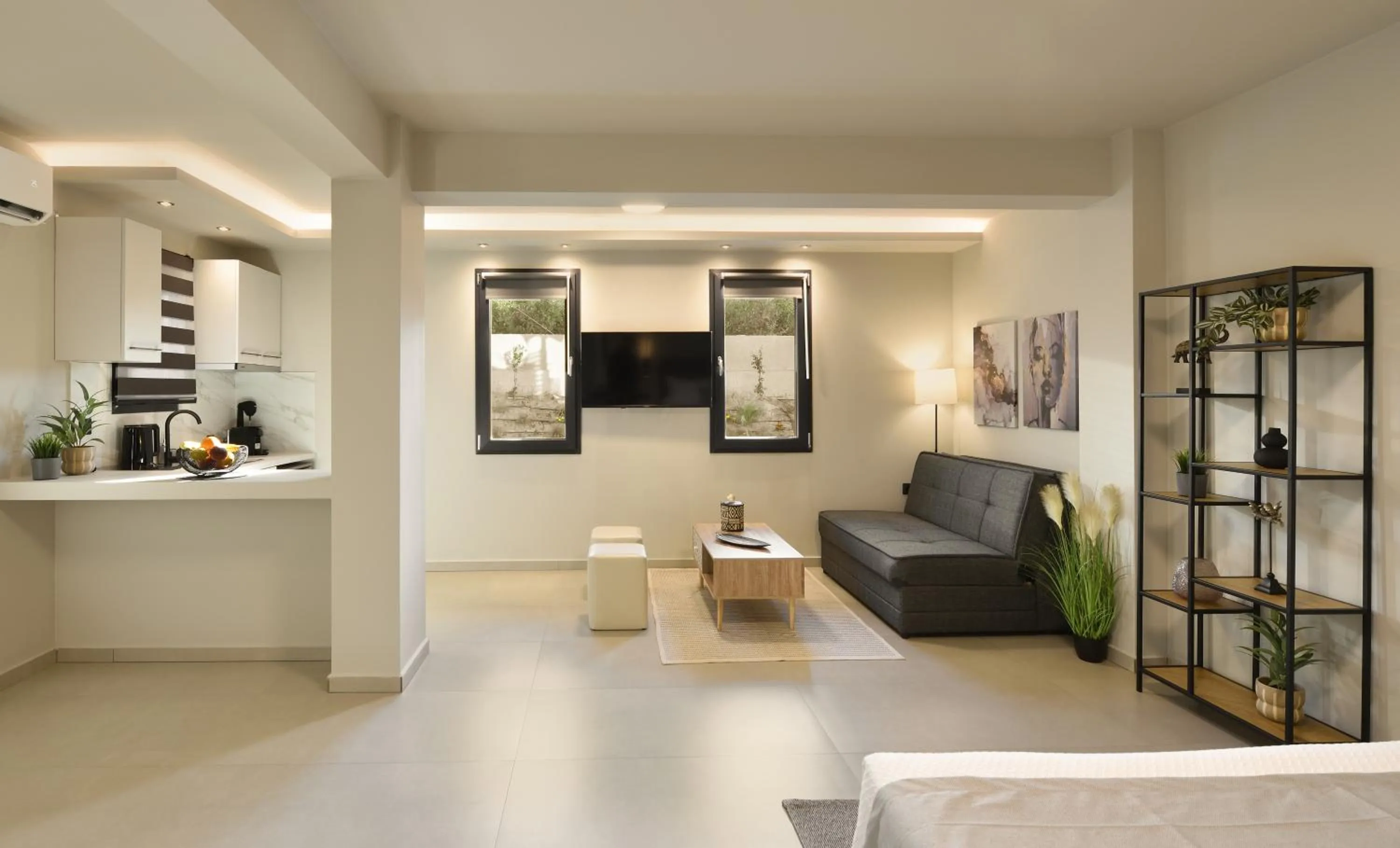 TV and multimedia in Olive All-Seasons Suites, Panel Hospitality Homes & Villas
