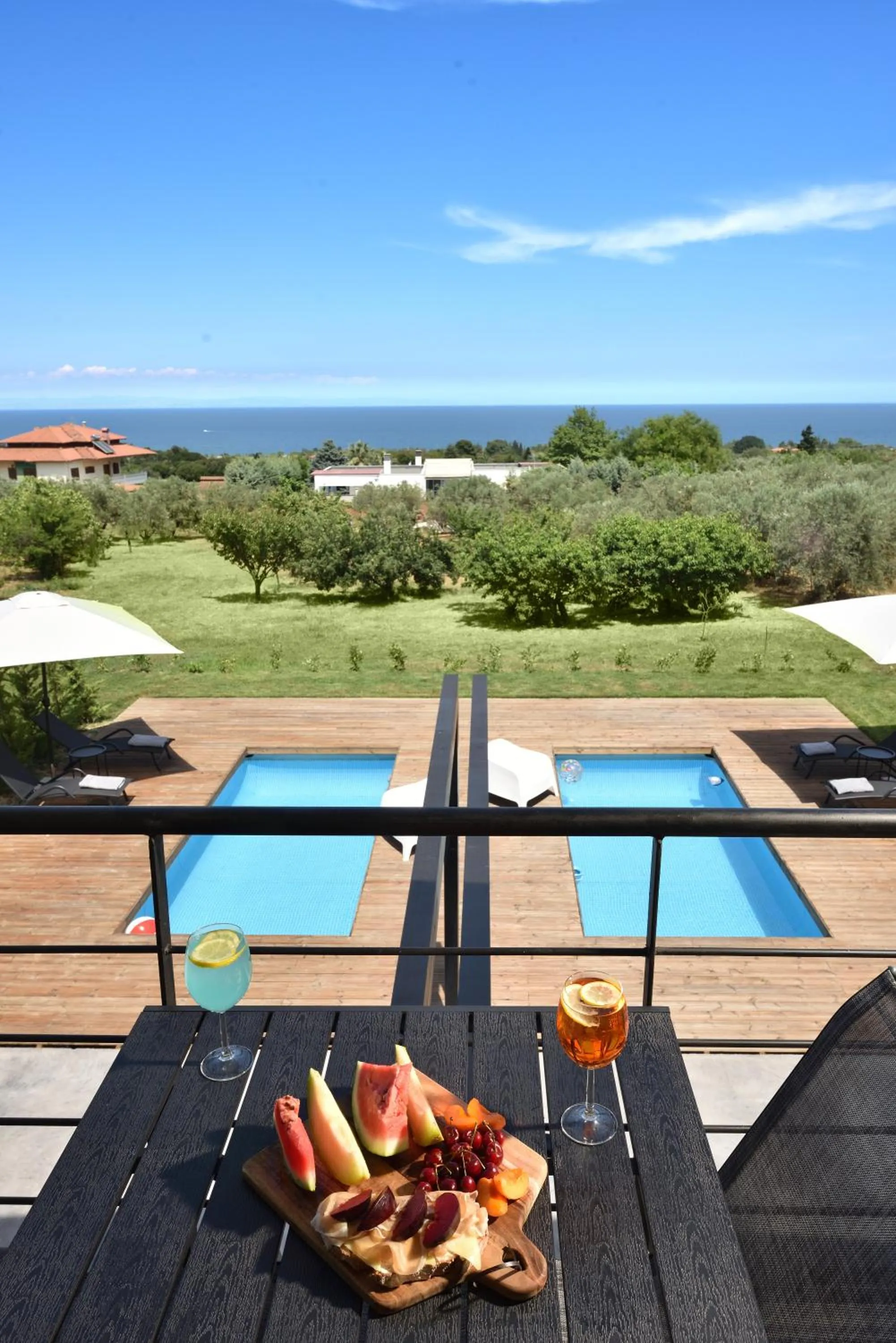 Pool view in Olive All-Seasons Suites, Panel Hospitality Homes & Villas