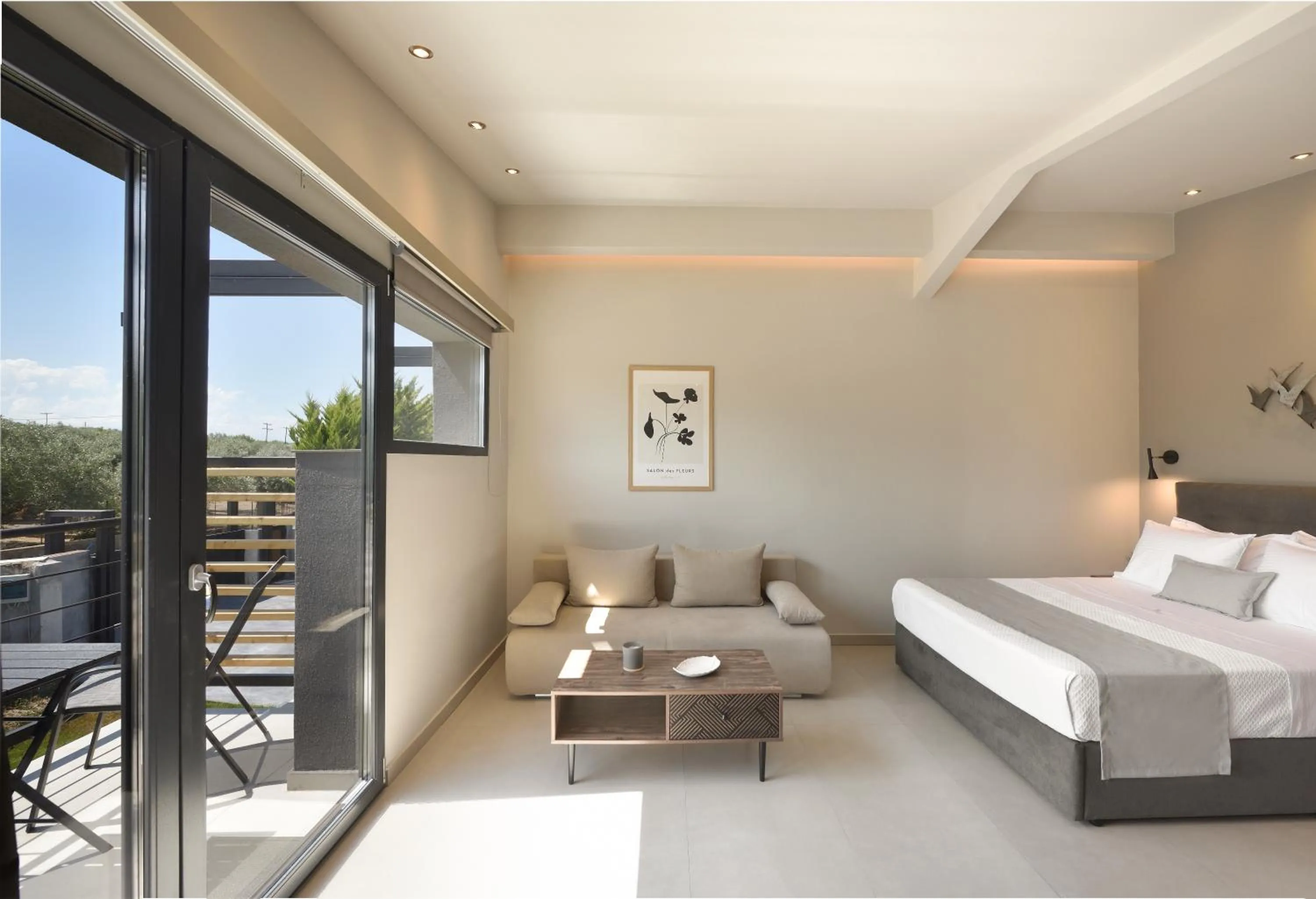 Seating area, Bed in Olive All-Seasons Suites, Panel Hospitality Homes & Villas