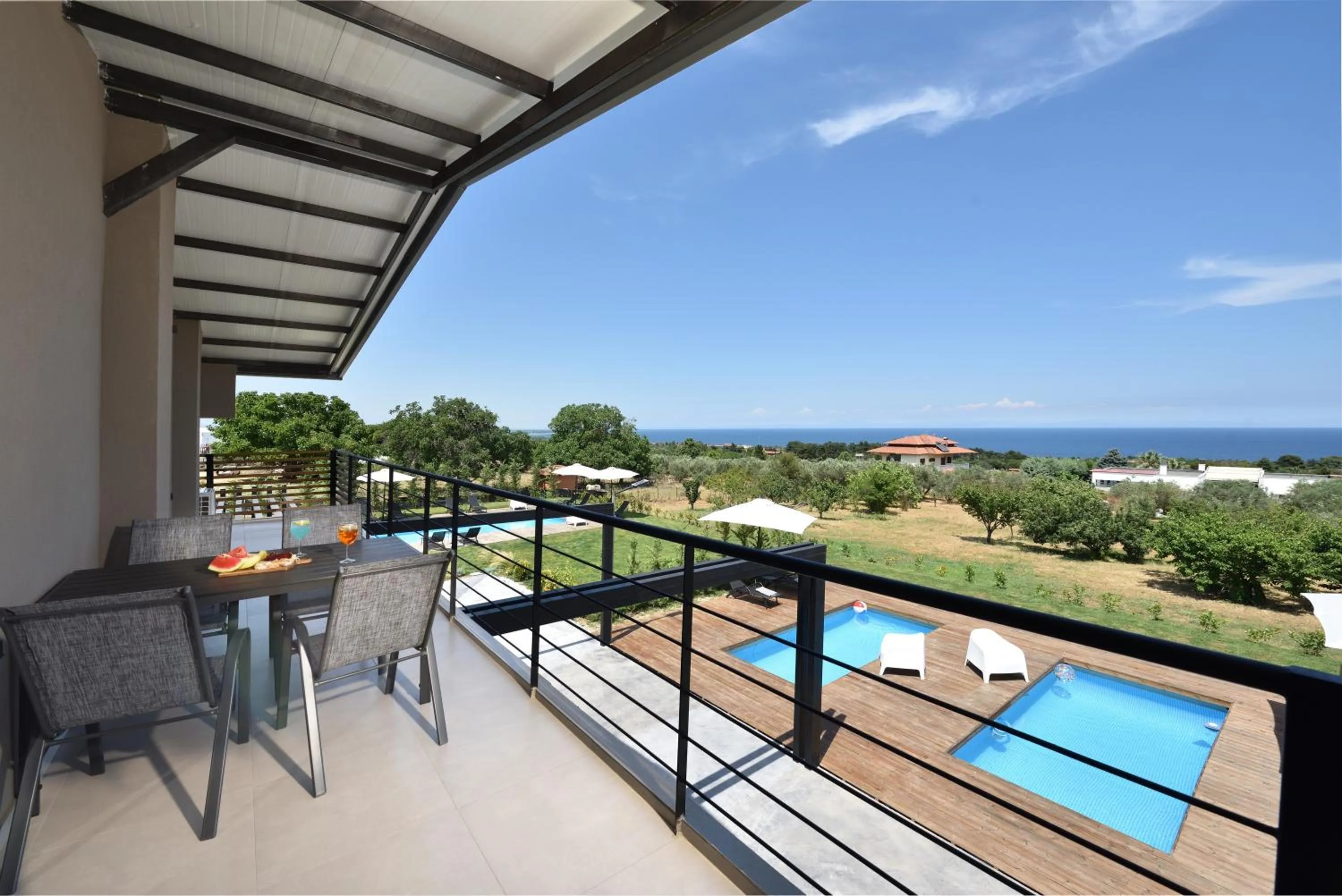 Balcony/Terrace in Olive All-Seasons Suites, Panel Hospitality Homes & Villas