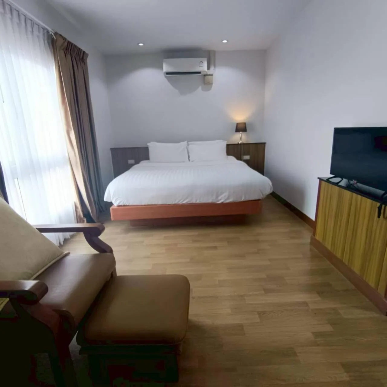 Bed in Cozy Donmueang Hotel