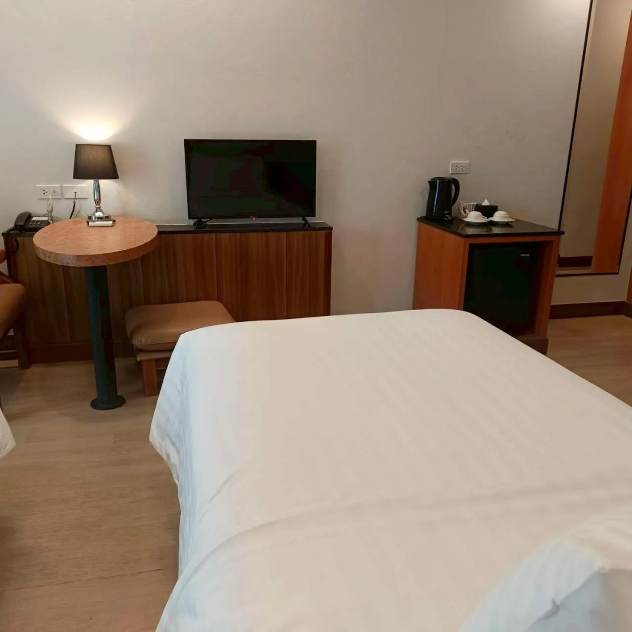 Bed in Cozy Donmueang Hotel