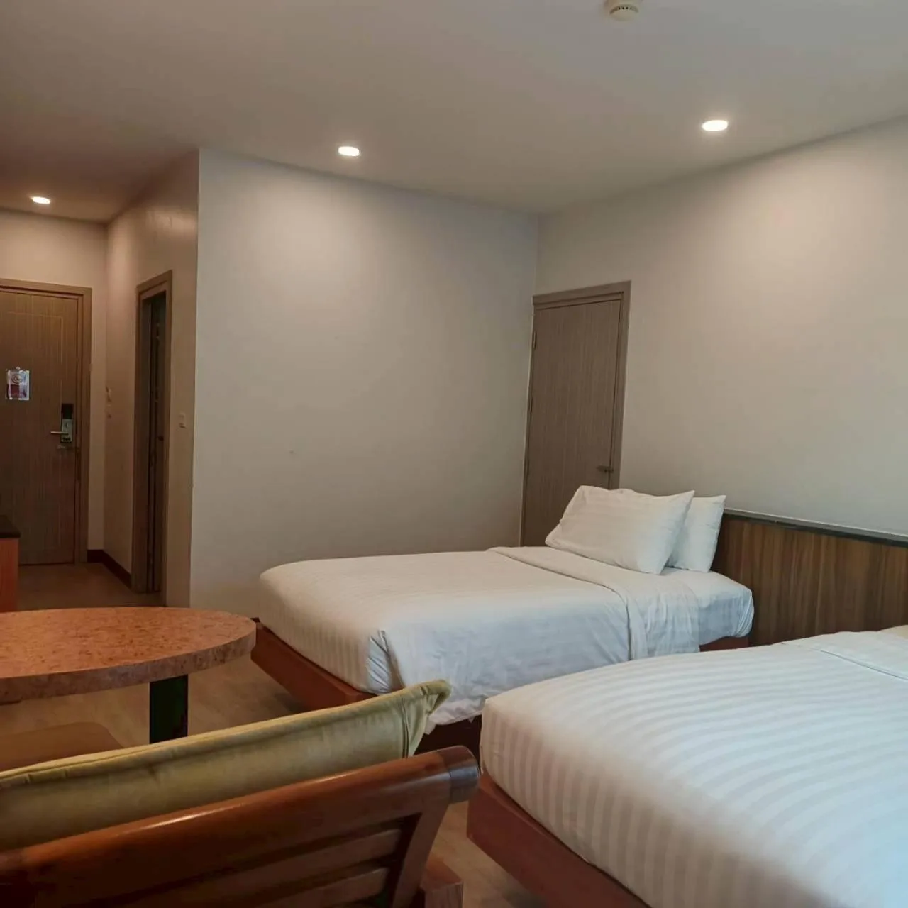 Bed in Cozy Donmueang Hotel