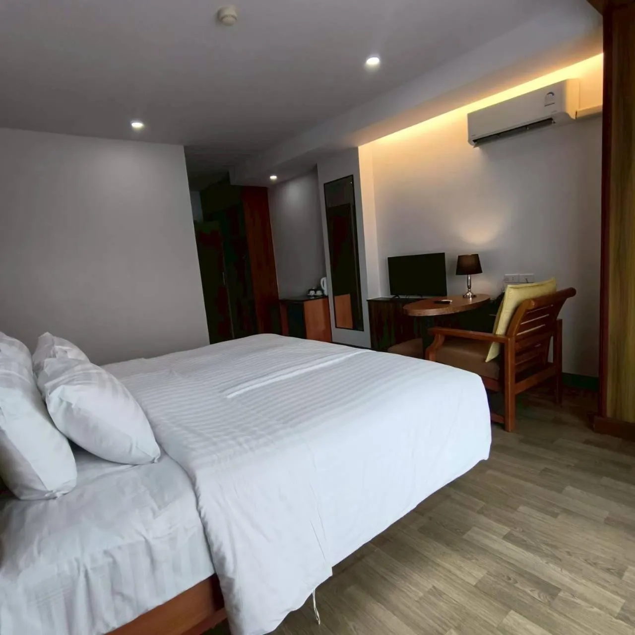 Bed in Cozy Donmueang Hotel