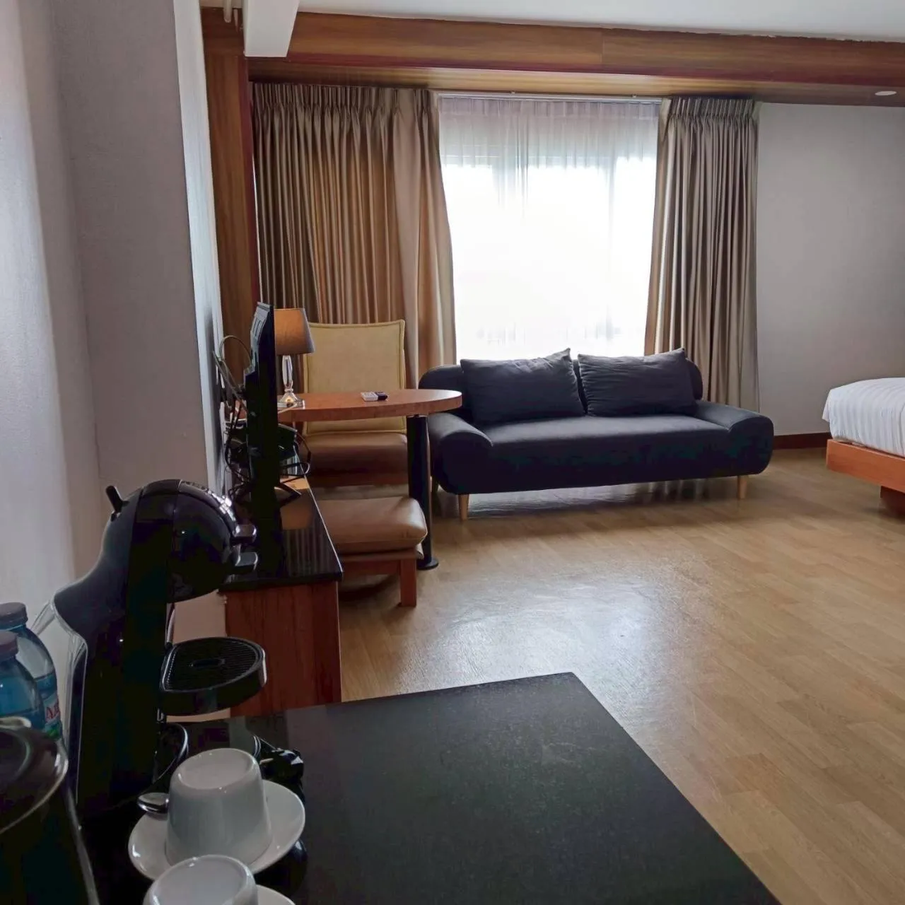 Bed in Cozy Donmueang Hotel