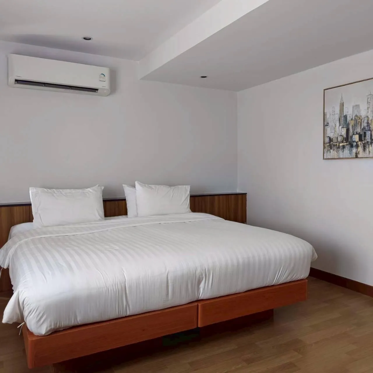 Bed in Cozy Donmueang Hotel