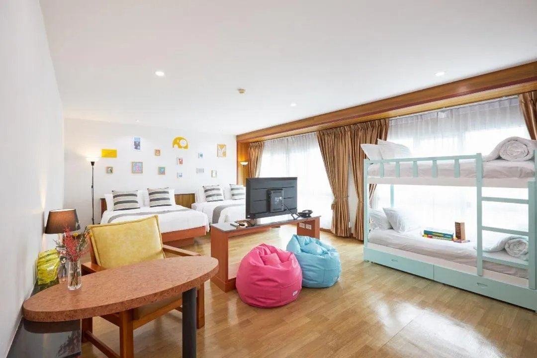 Bed in Cozy Donmueang Hotel