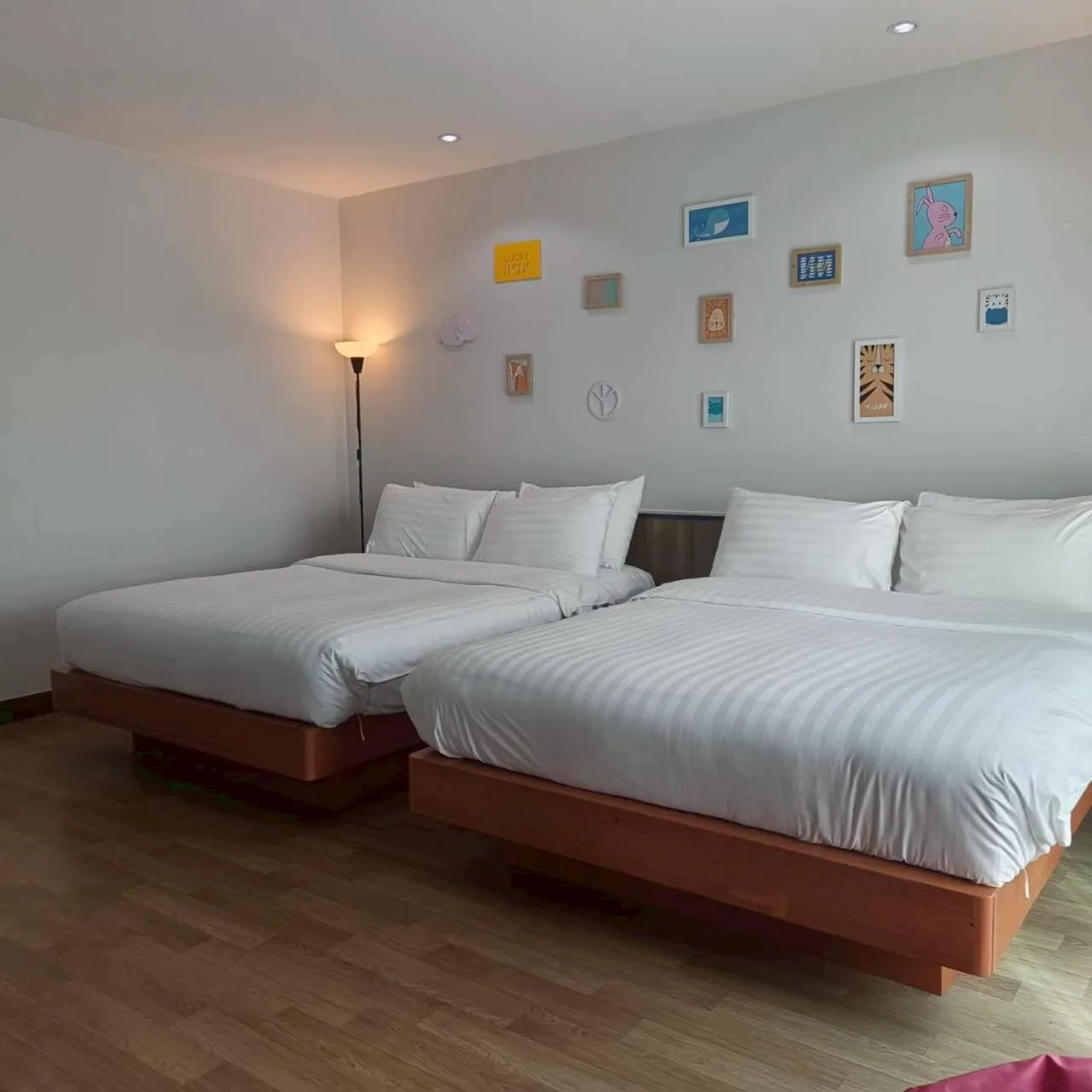 Bed in Cozy Donmueang Hotel