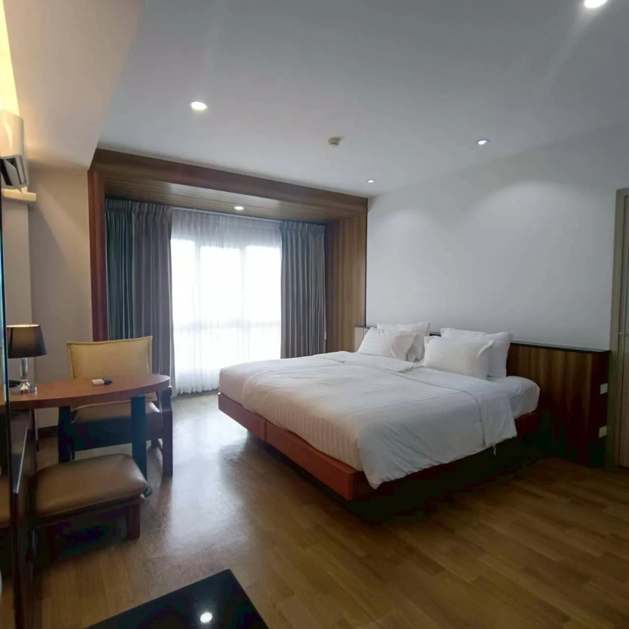 Bed in Cozy Donmueang Hotel