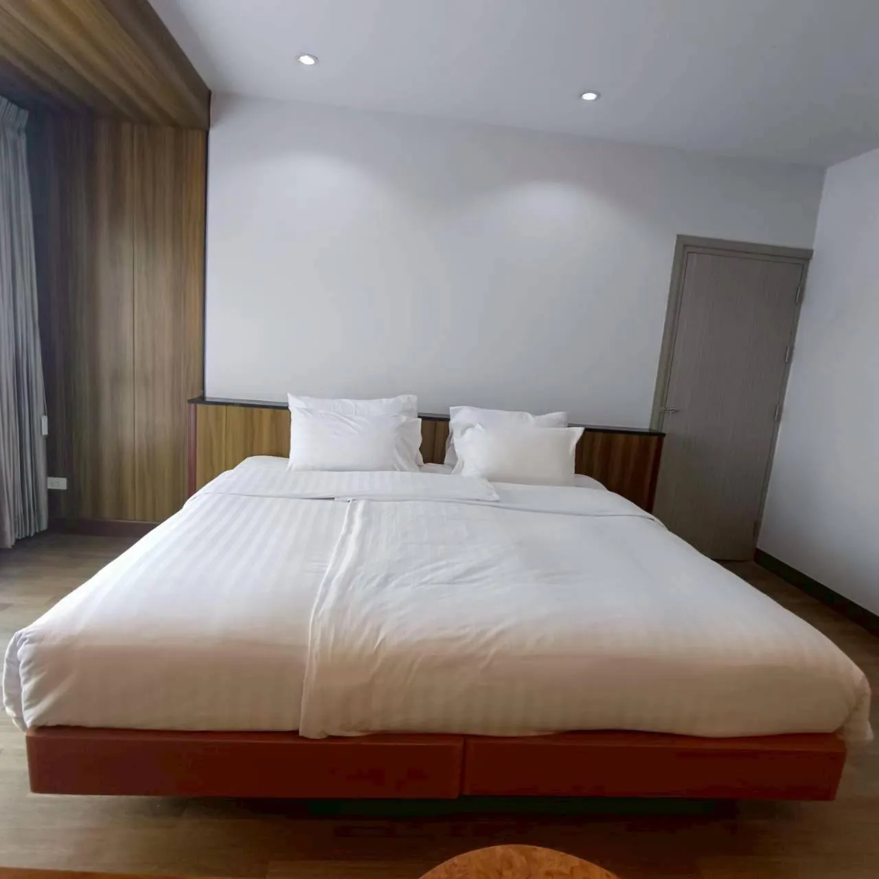 Bed in Cozy Donmueang Hotel