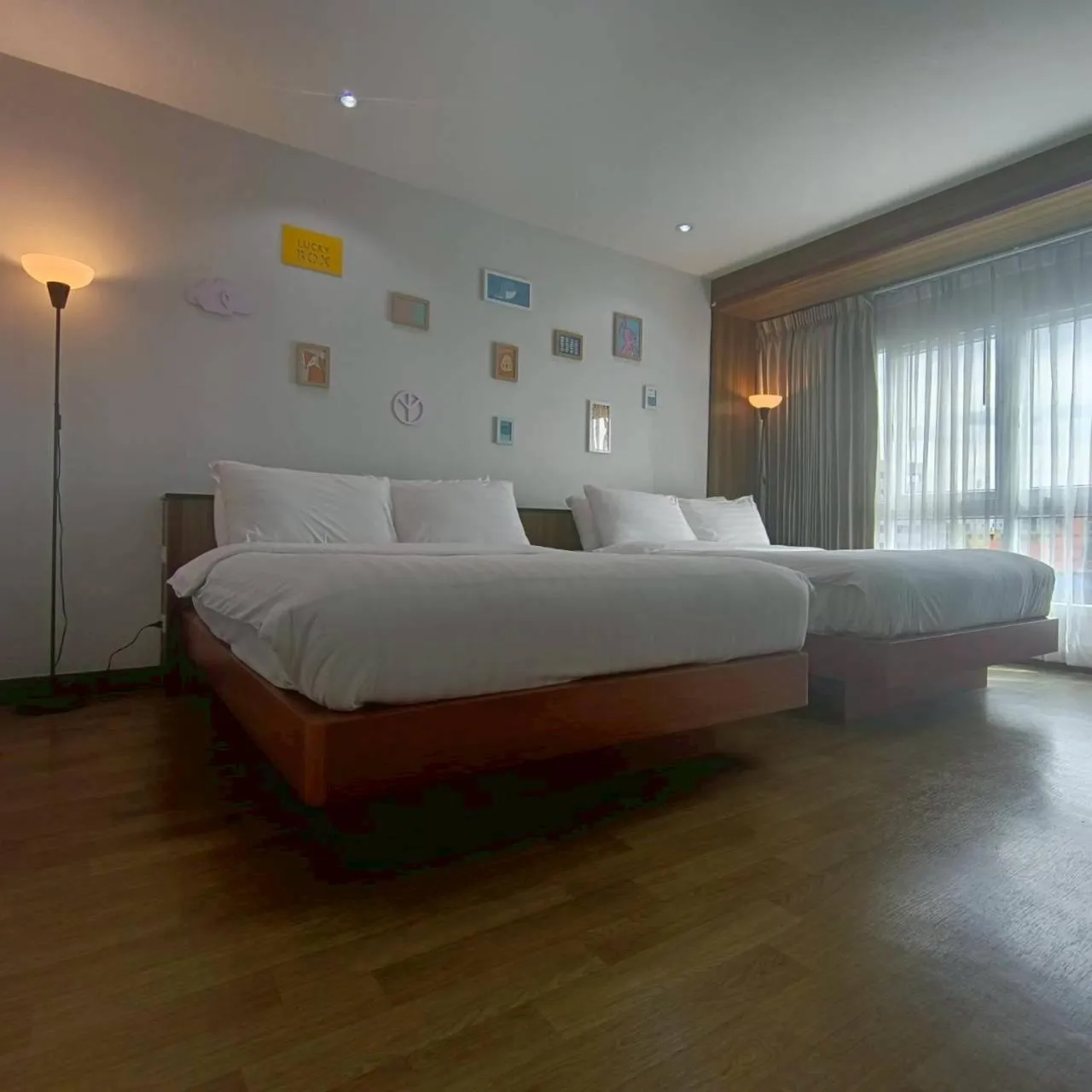 Bed in Cozy Donmueang Hotel