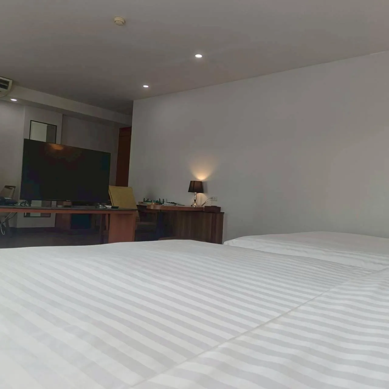 Bed in Cozy Donmueang Hotel