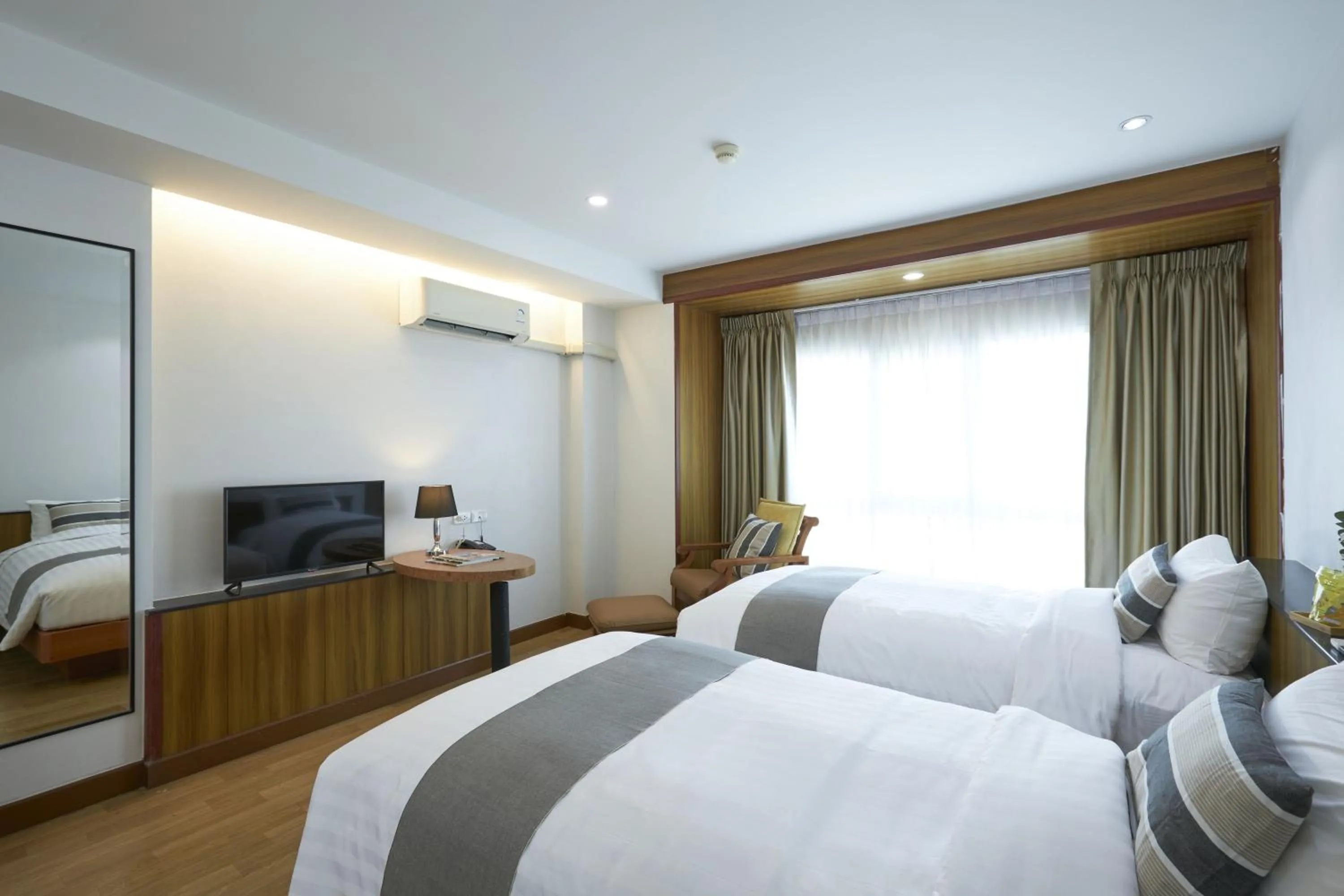 Bedroom, Bed in Cozy Donmueang Hotel