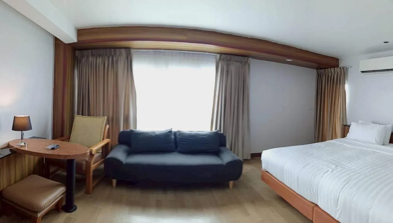 Bed in Cozy Donmueang Hotel