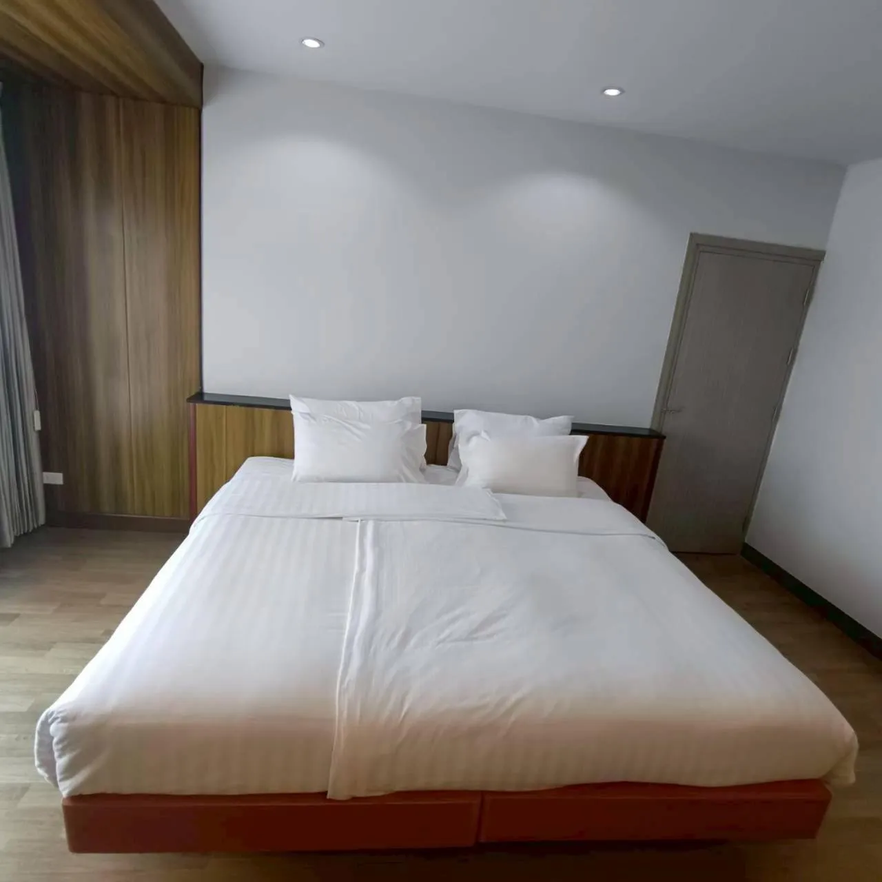 Bed in Cozy Donmueang Hotel