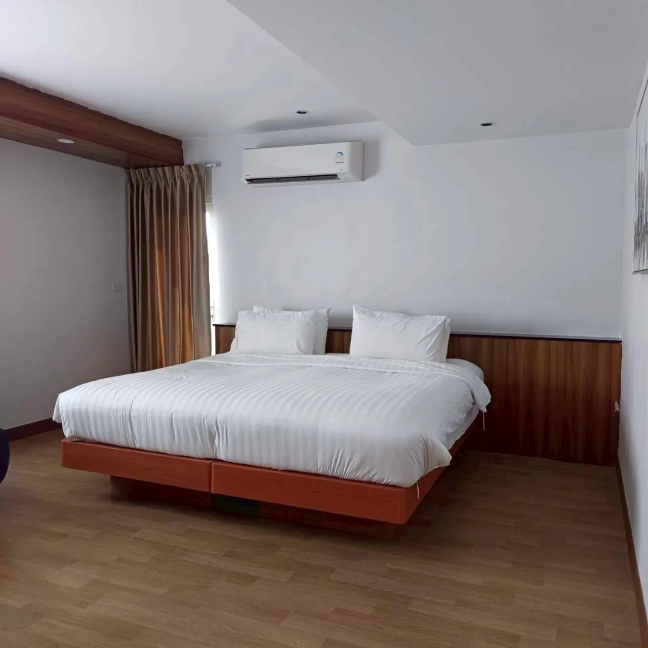 Bed in Cozy Donmueang Hotel