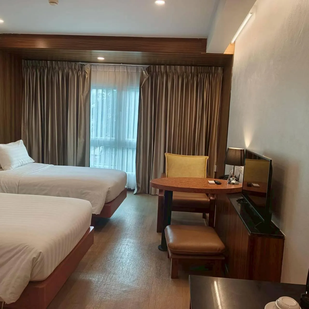 Bed in Cozy Donmueang Hotel