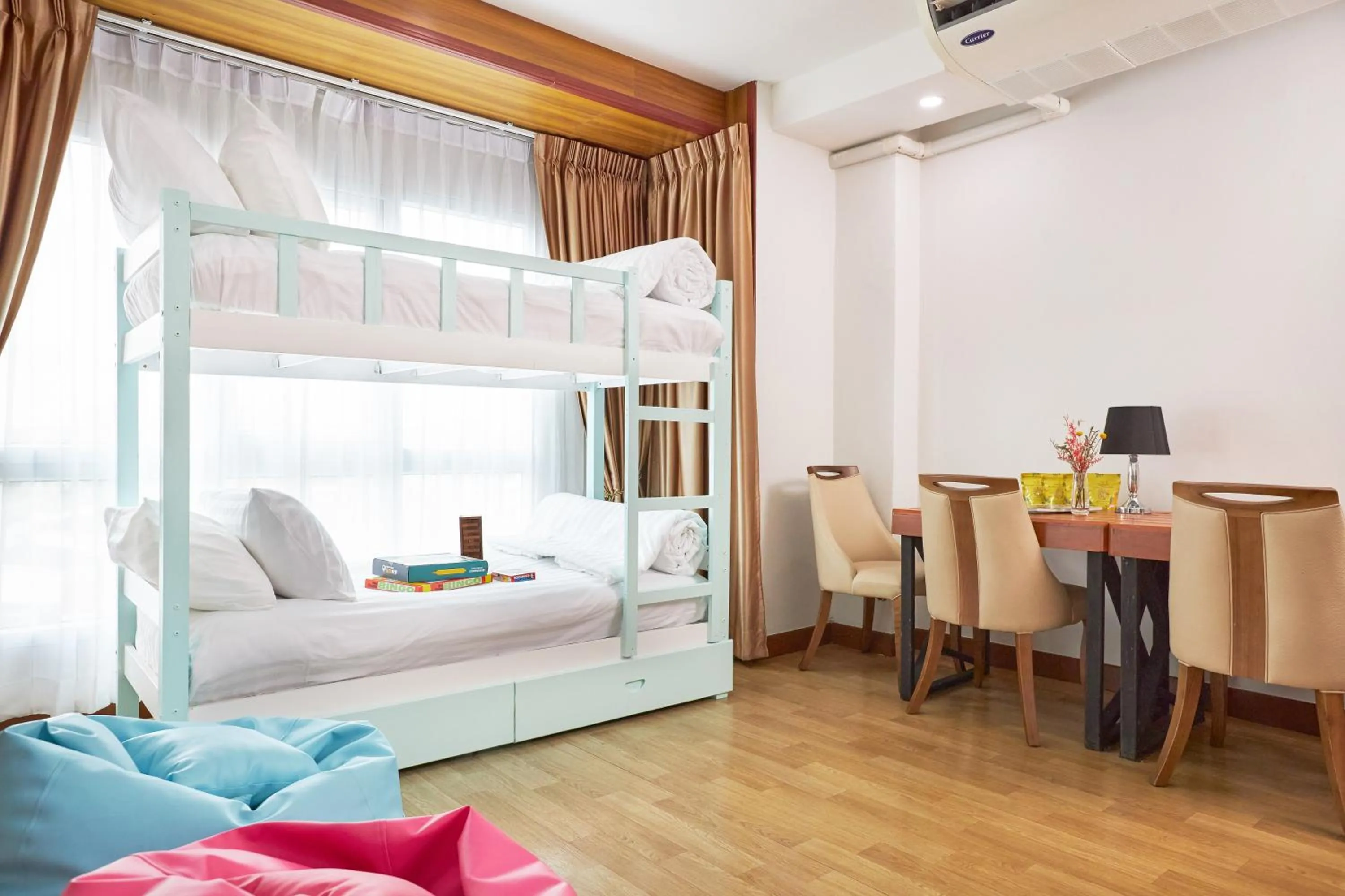 Bed in Cozy Donmueang Hotel