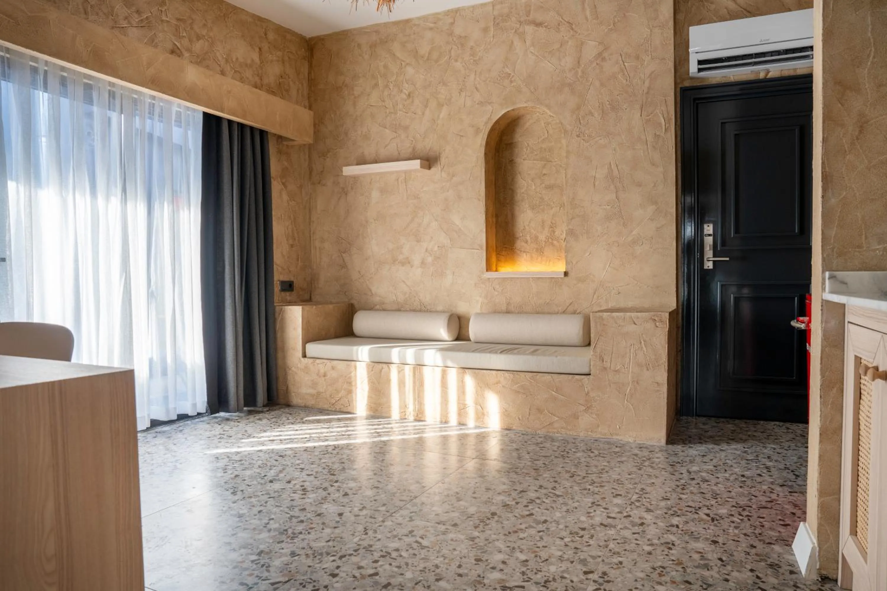 Living room in Lucky Monkey Midi Hotel