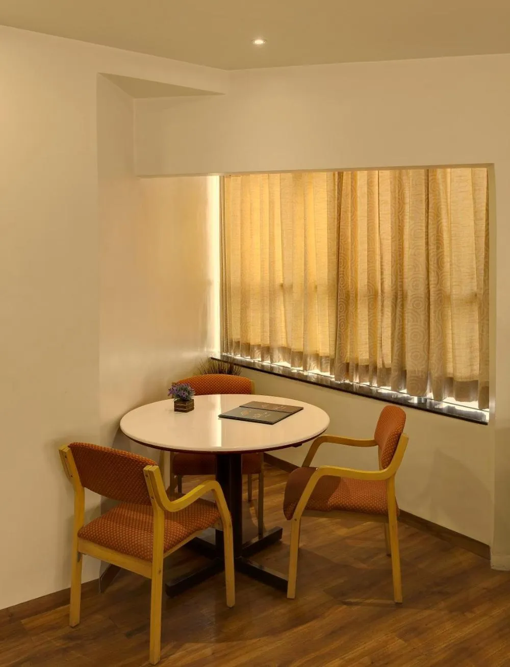 Seating area in Hotel Orient Crown, Kolhapur