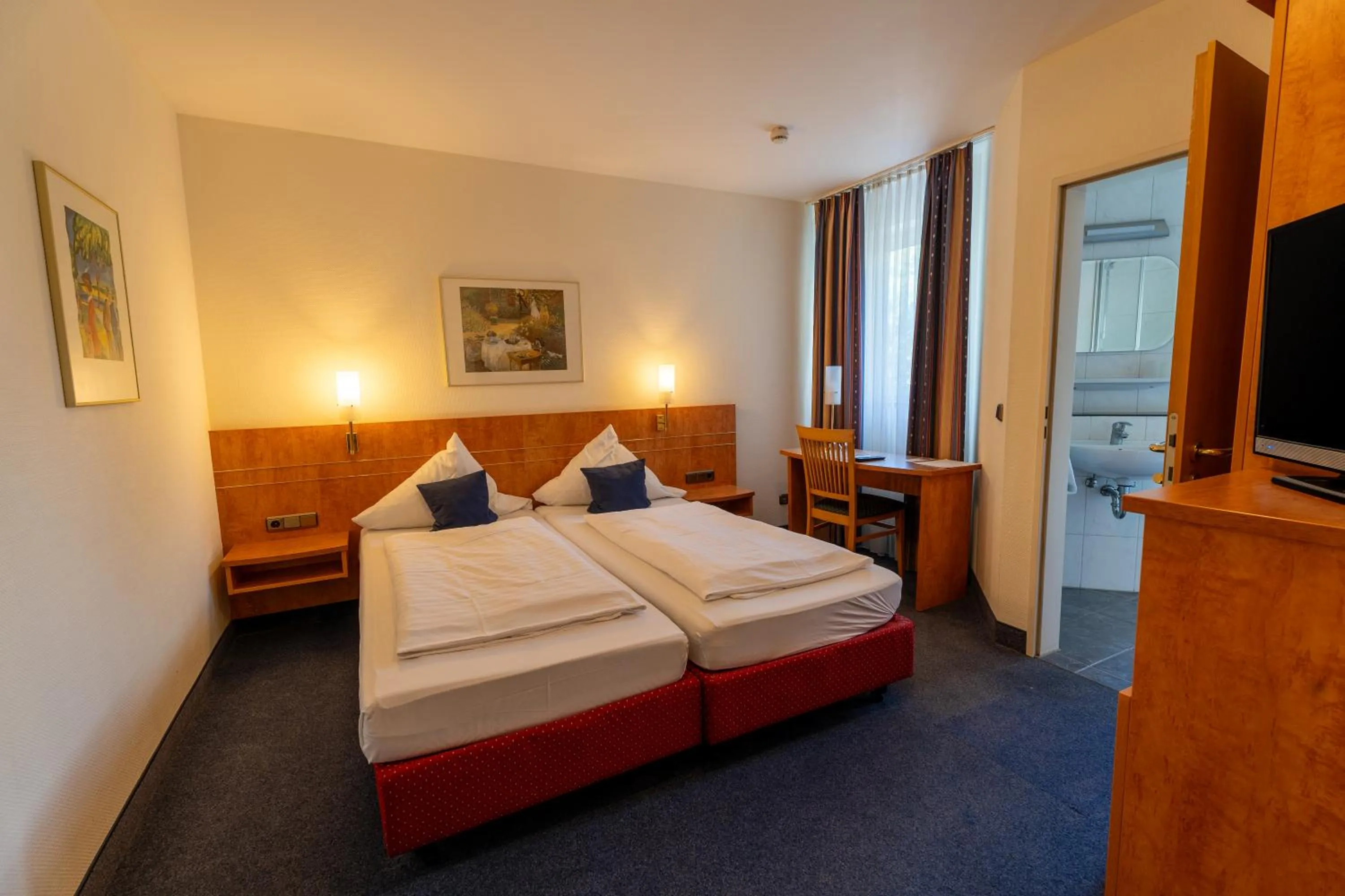 Bed in Airport Business Hotel Köln