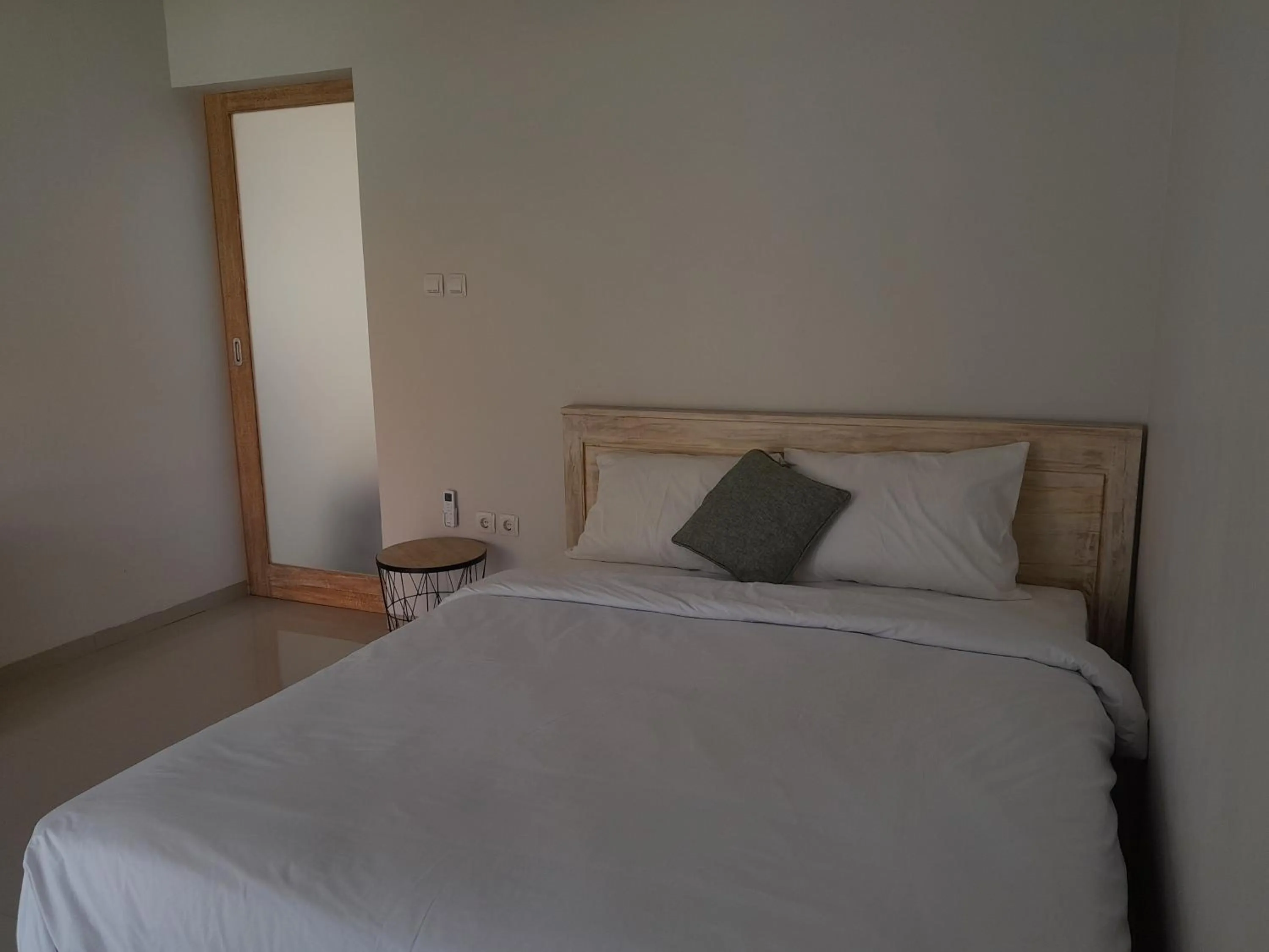 Bed in Maha Rama Villas Amed