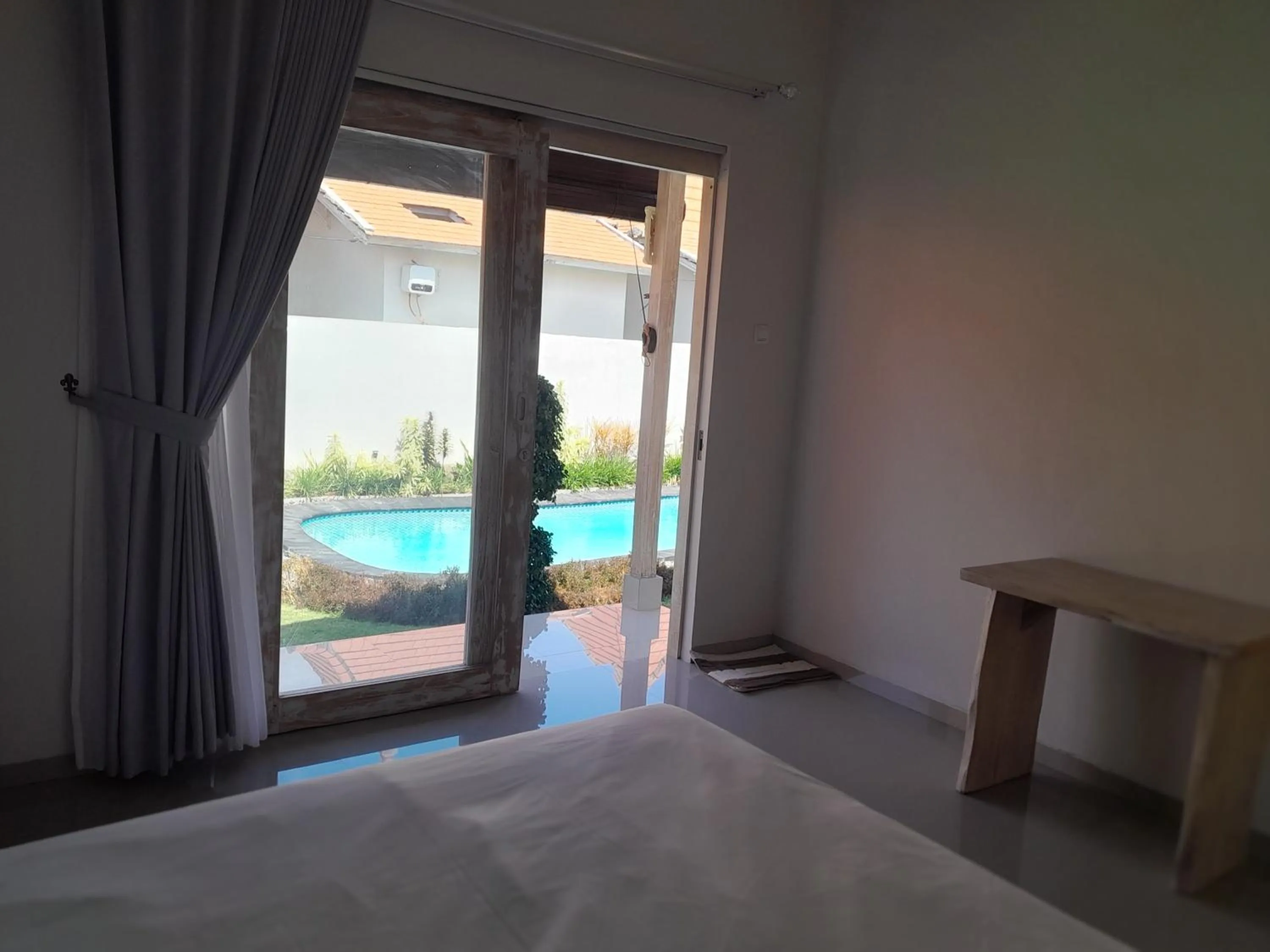 Bed in Maha Rama Villas Amed