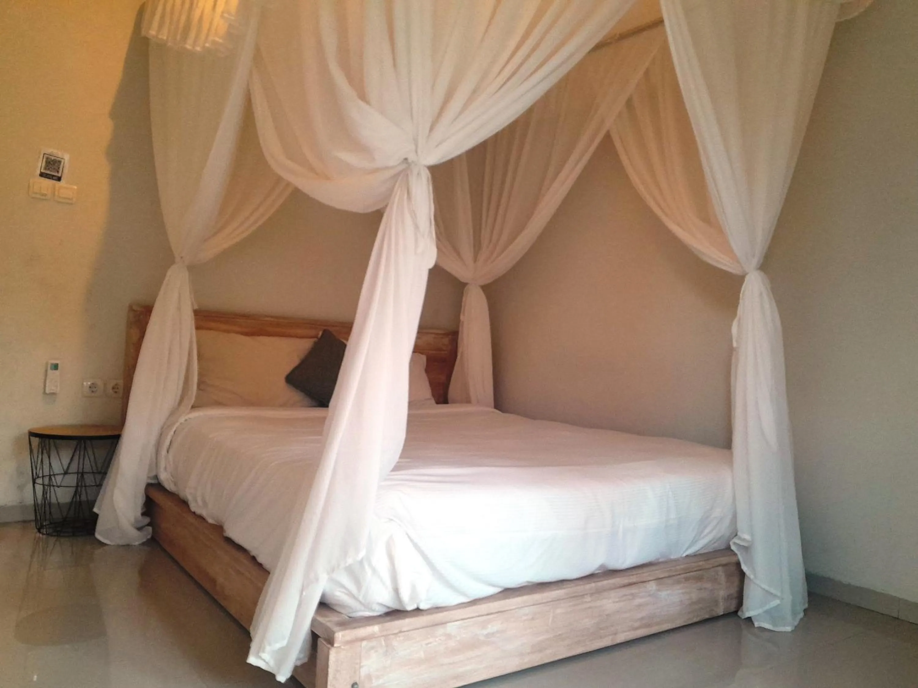 Bed in Maha Rama Villas Amed