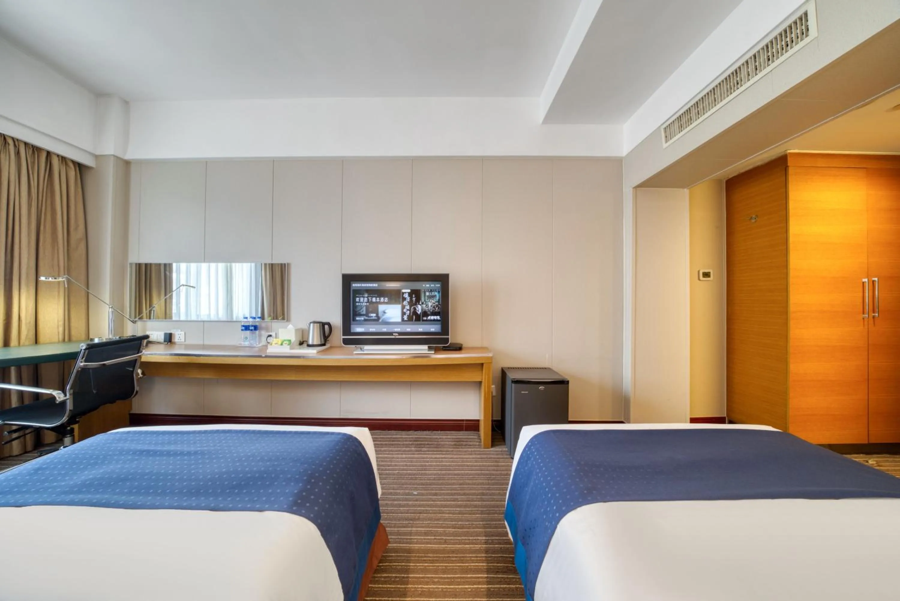 Bed in Hangzhou Haixin Hotel