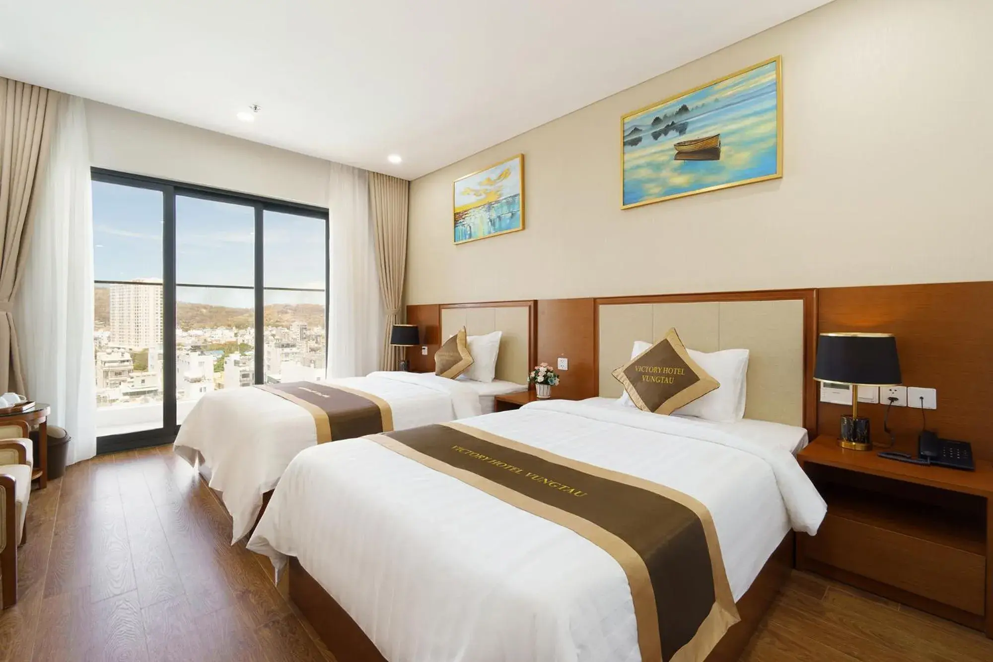 Twin Room with Balcony and Partial Sea View in Victory Hotel Vung Tau - New Wing Twin Room with Balcony and Partial Sea View in Victory Hotel Vung Tau - New Wing