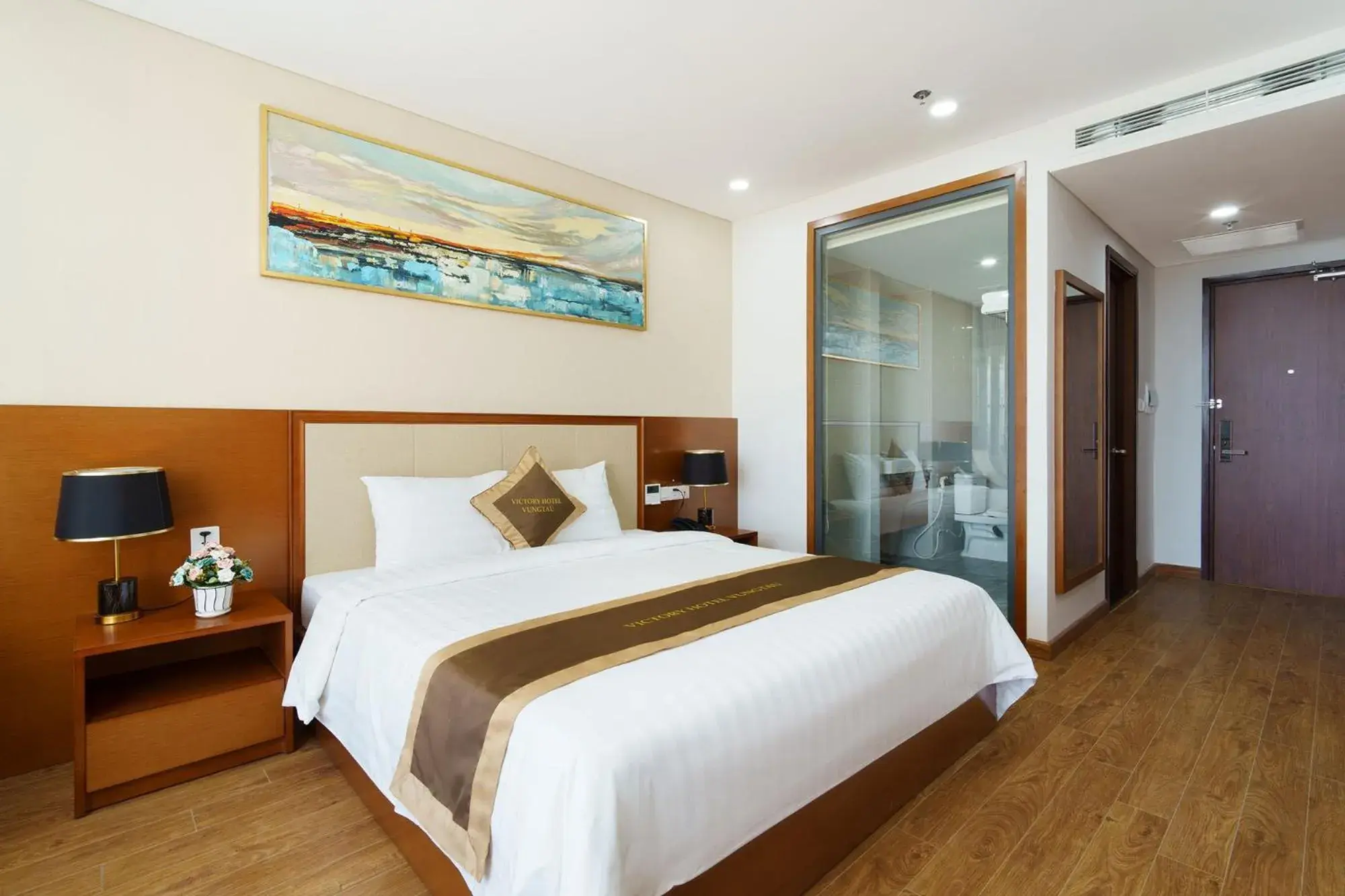 Deluxe Double Room with Balcony and Partial Sea View in Victory Hotel Vung Tau - New Wing Deluxe Double Room with Balcony and Partial Sea View in Victory Hotel Vung Tau - New Wing