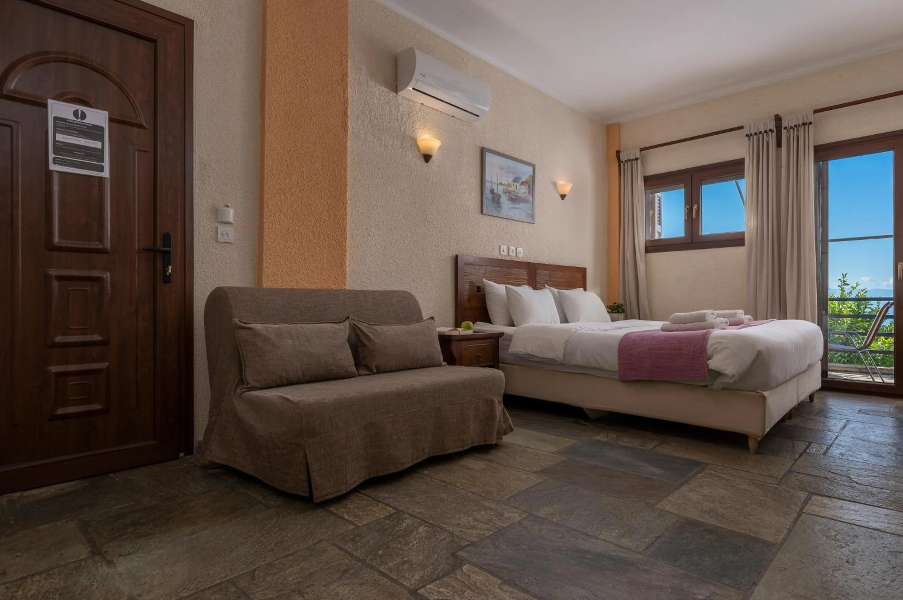 Bed in Agnanti Hotel Apartments