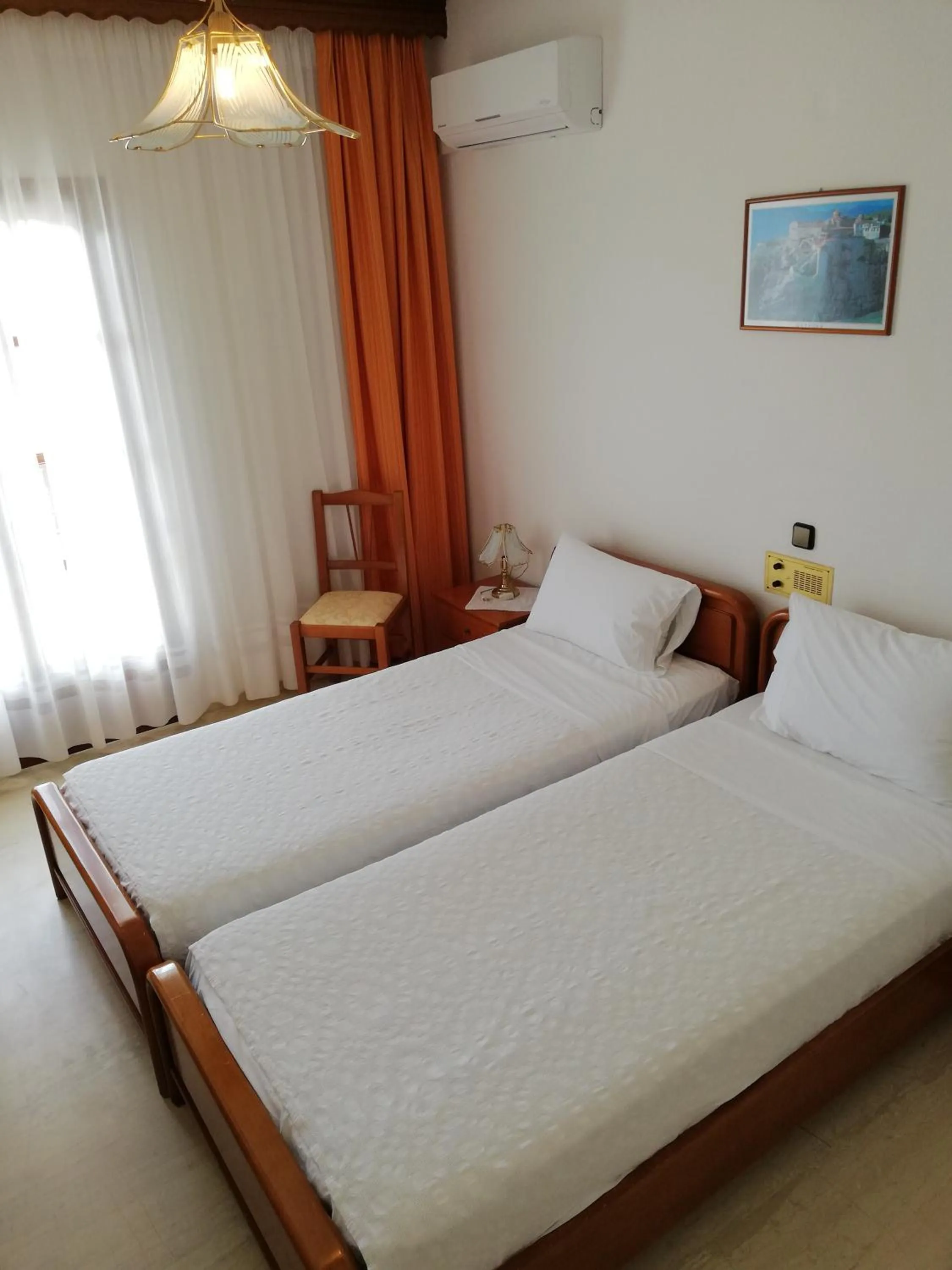 Bed in Hotel Paradise