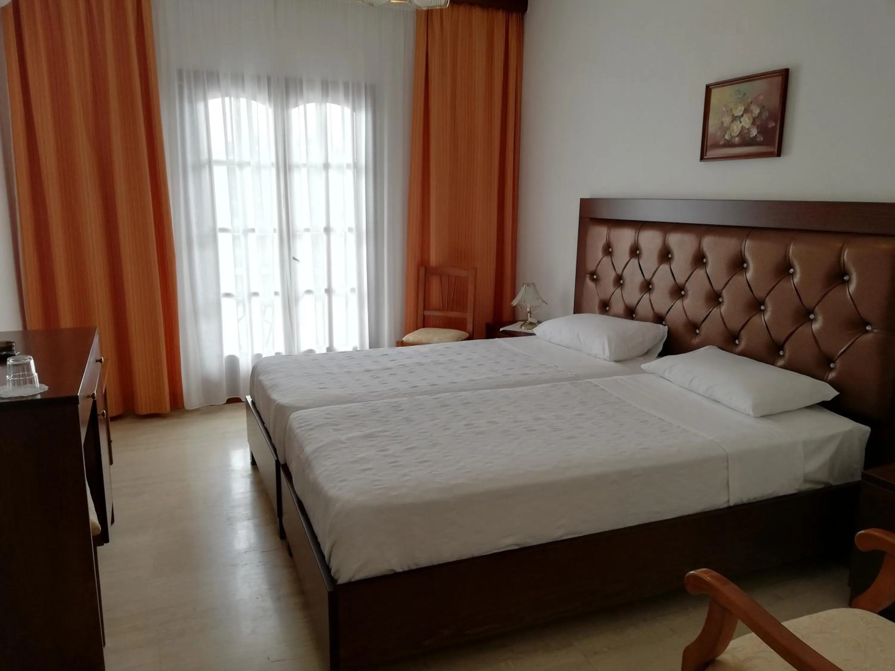 Bed in Hotel Paradise