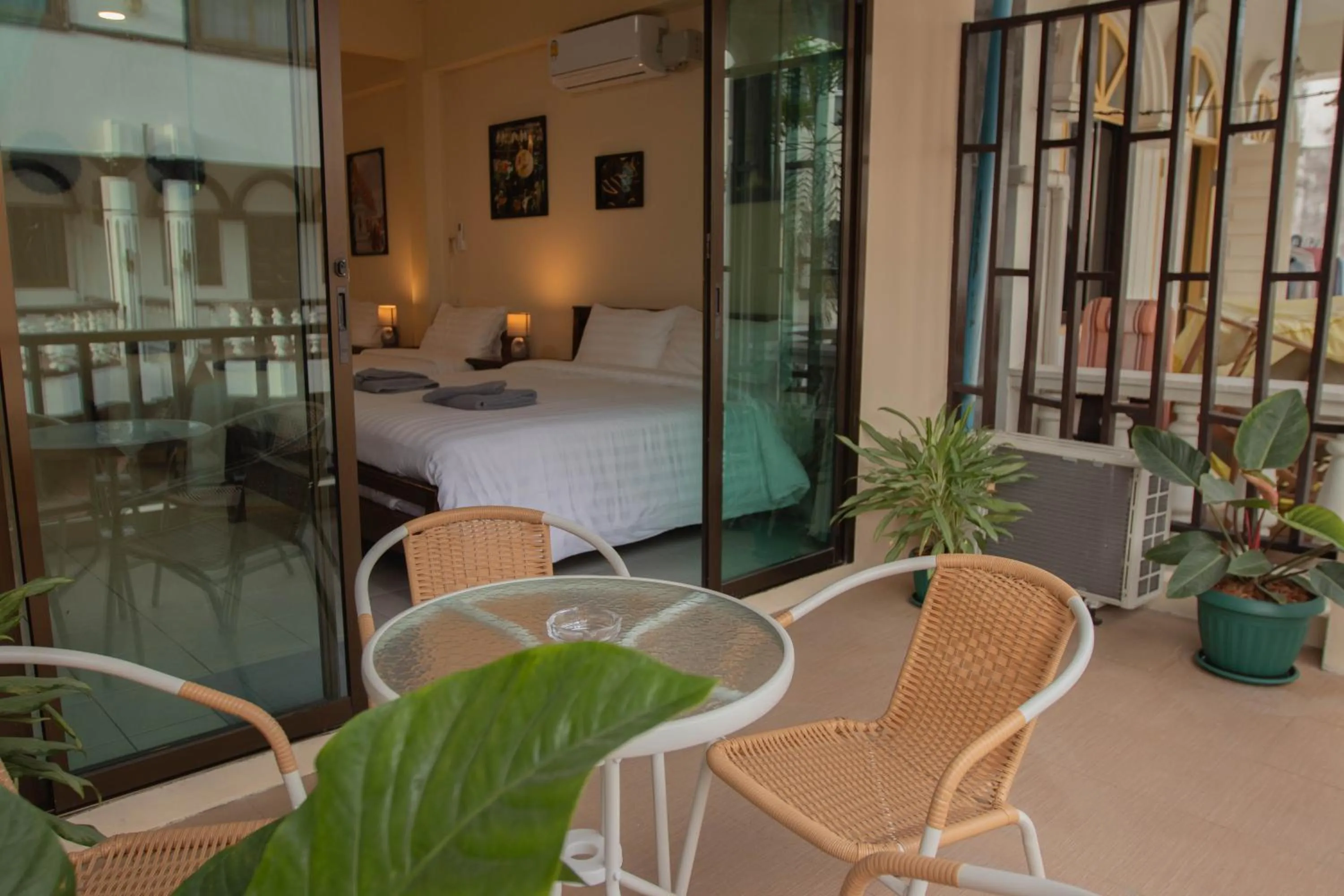 Balcony/Terrace, Bed in Maiiam Guesthouse Patong