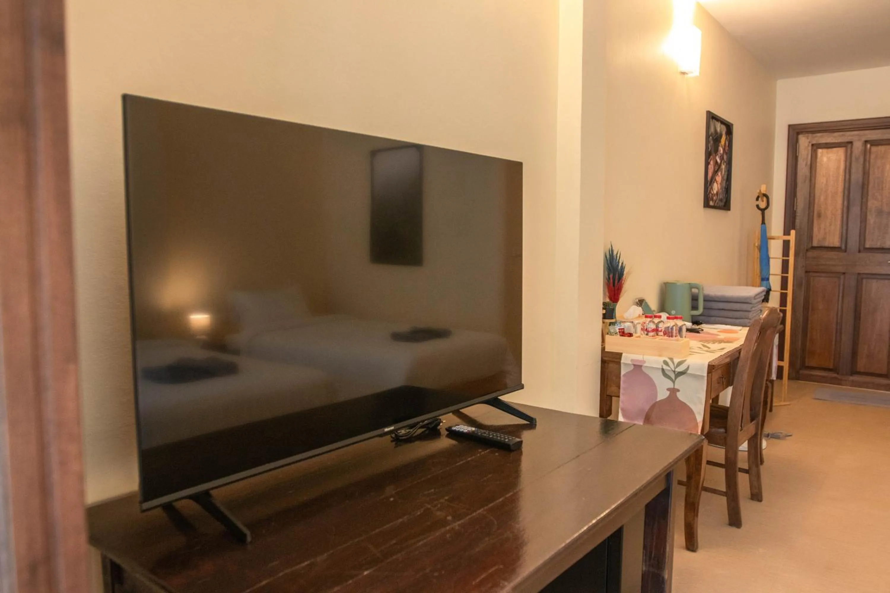 TV and multimedia in Maiiam Guesthouse Patong