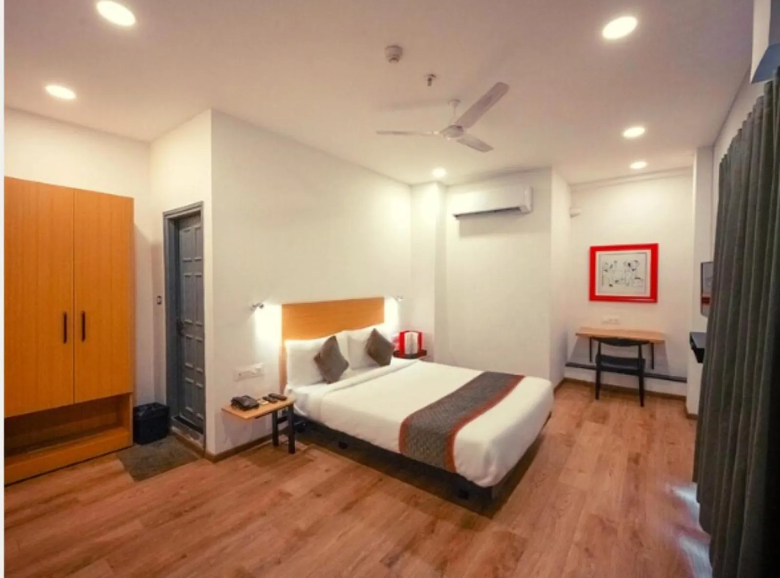 Photo of the whole room, Bed in Hotel Signature, Nagpur