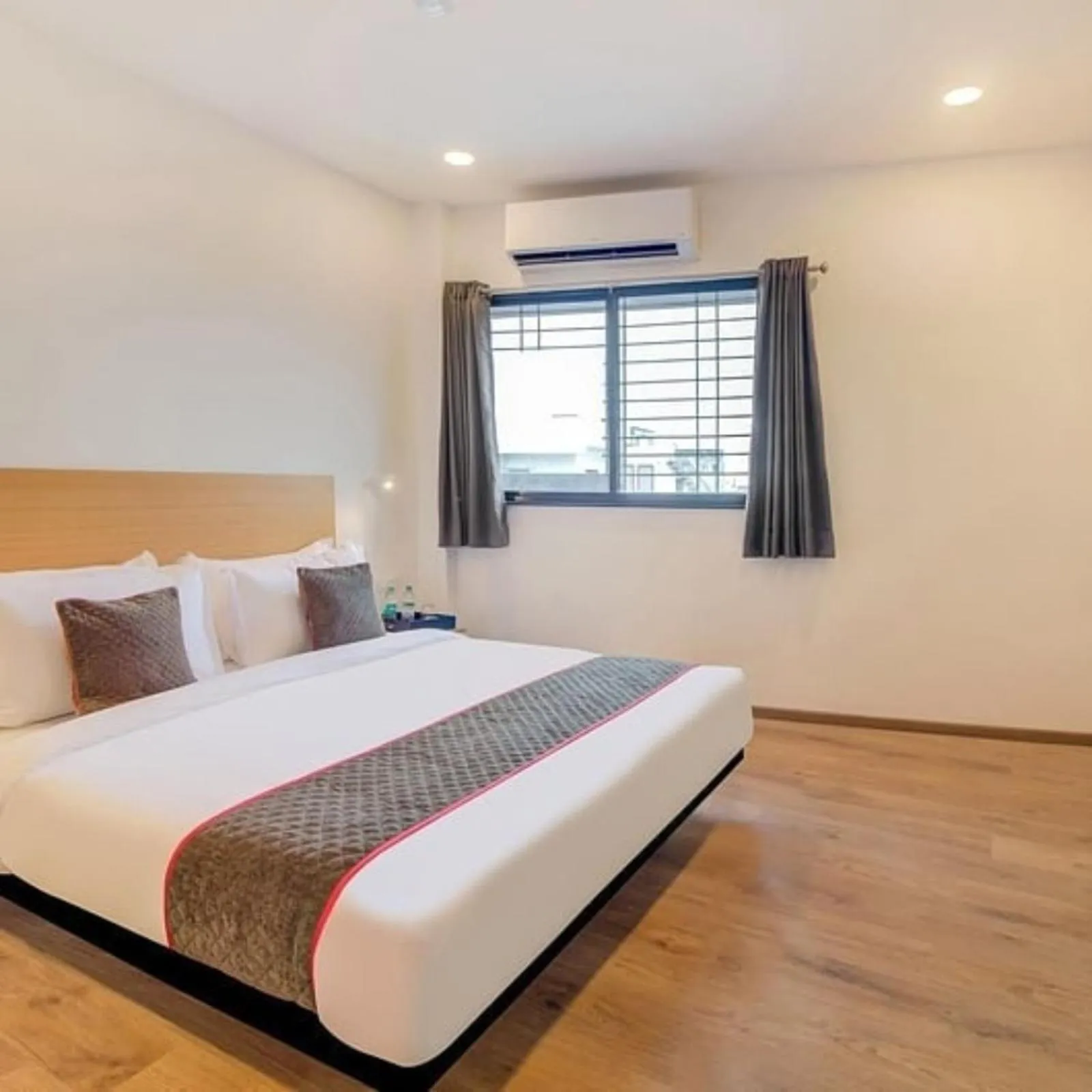 Photo of the whole room, Bed in Hotel Signature, Nagpur