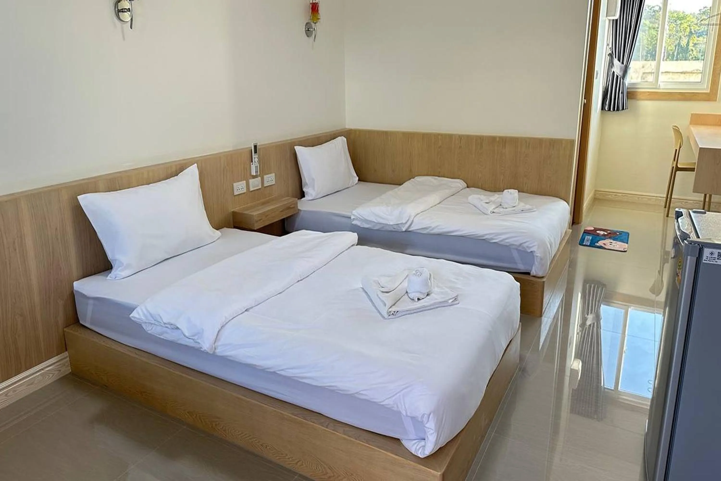 Bed in The White House P&N Hotel Chiang Rai