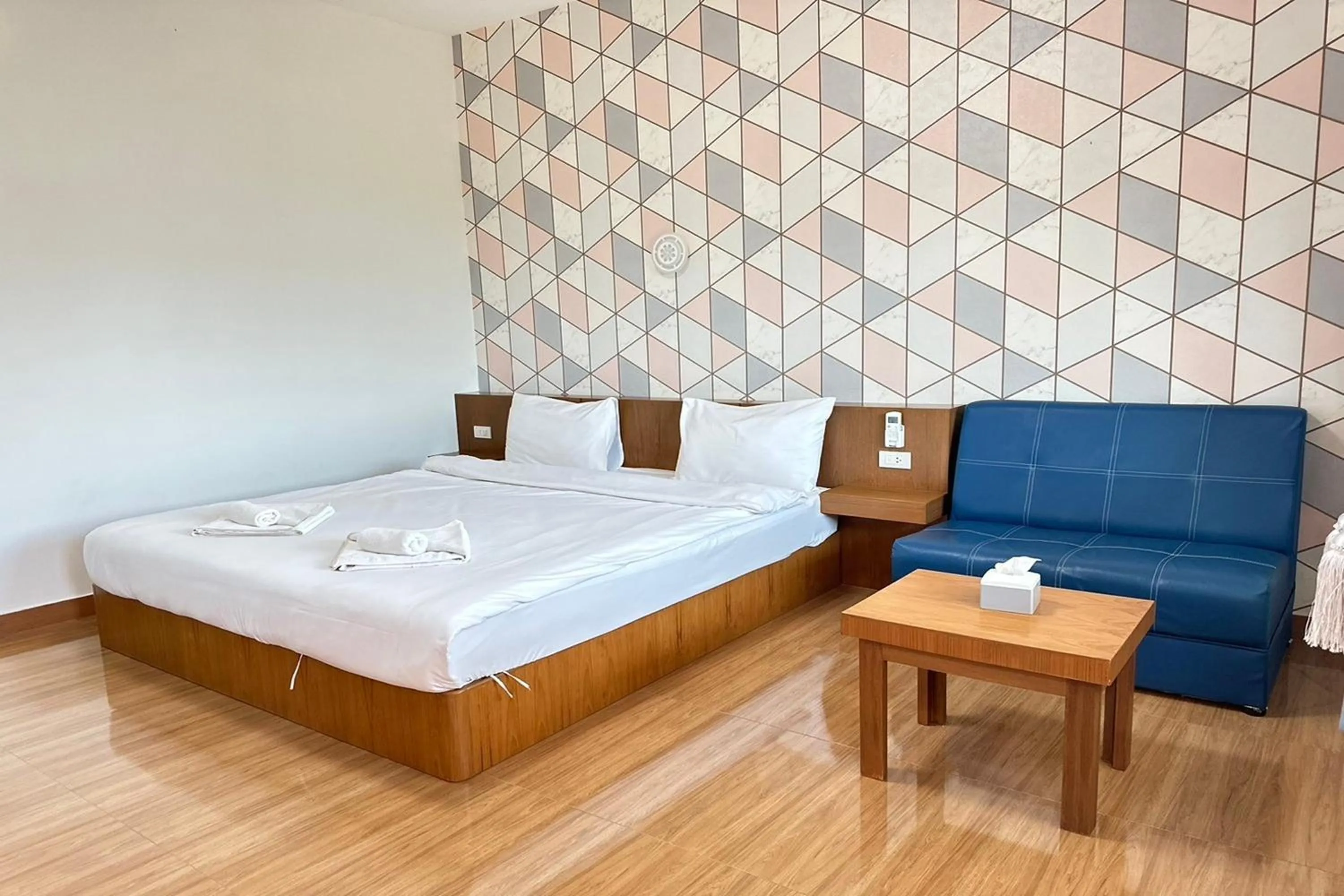 Bed in The White House P&N Hotel Chiang Rai