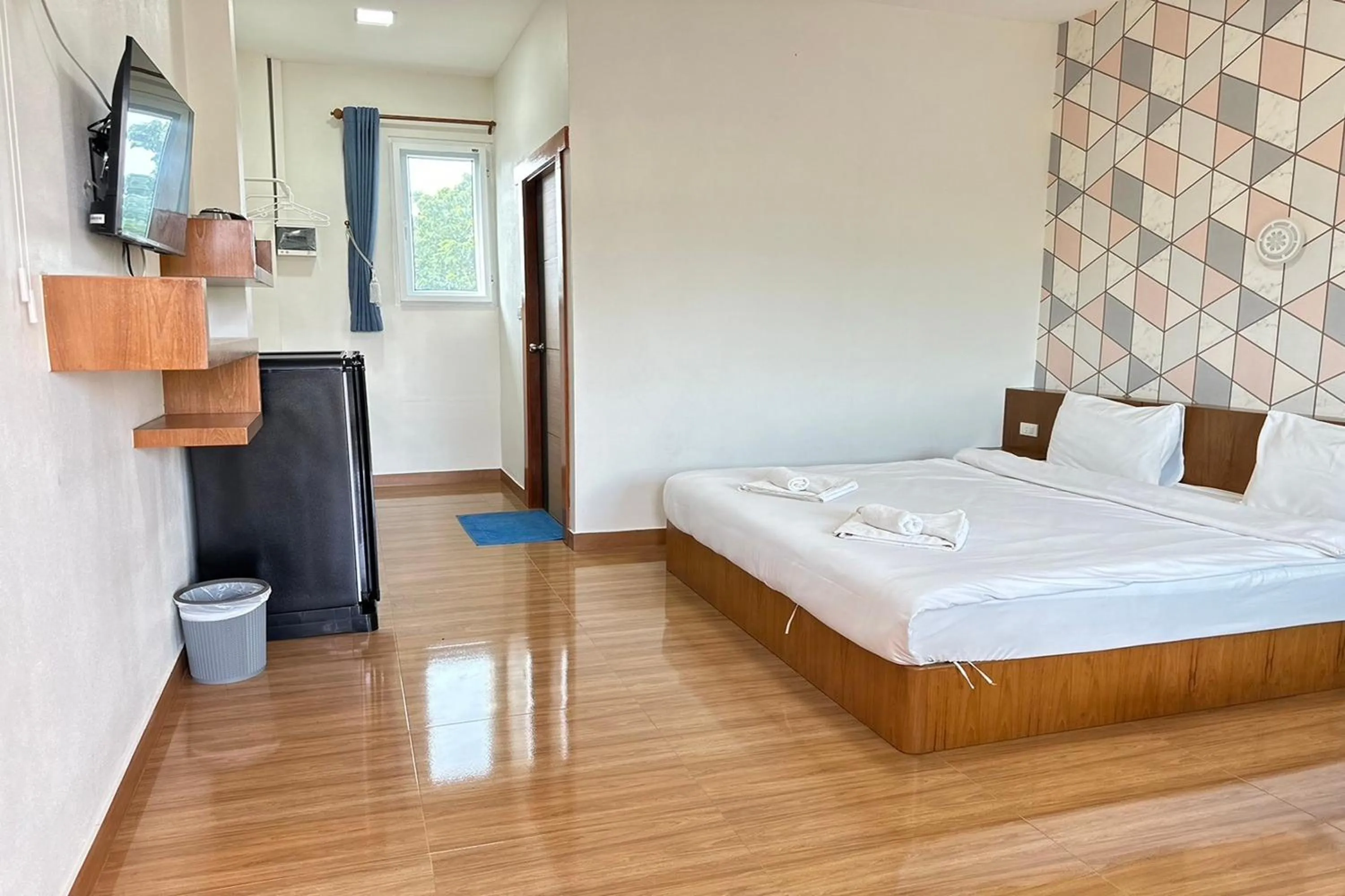 Bed in The White House P&N Hotel Chiang Rai