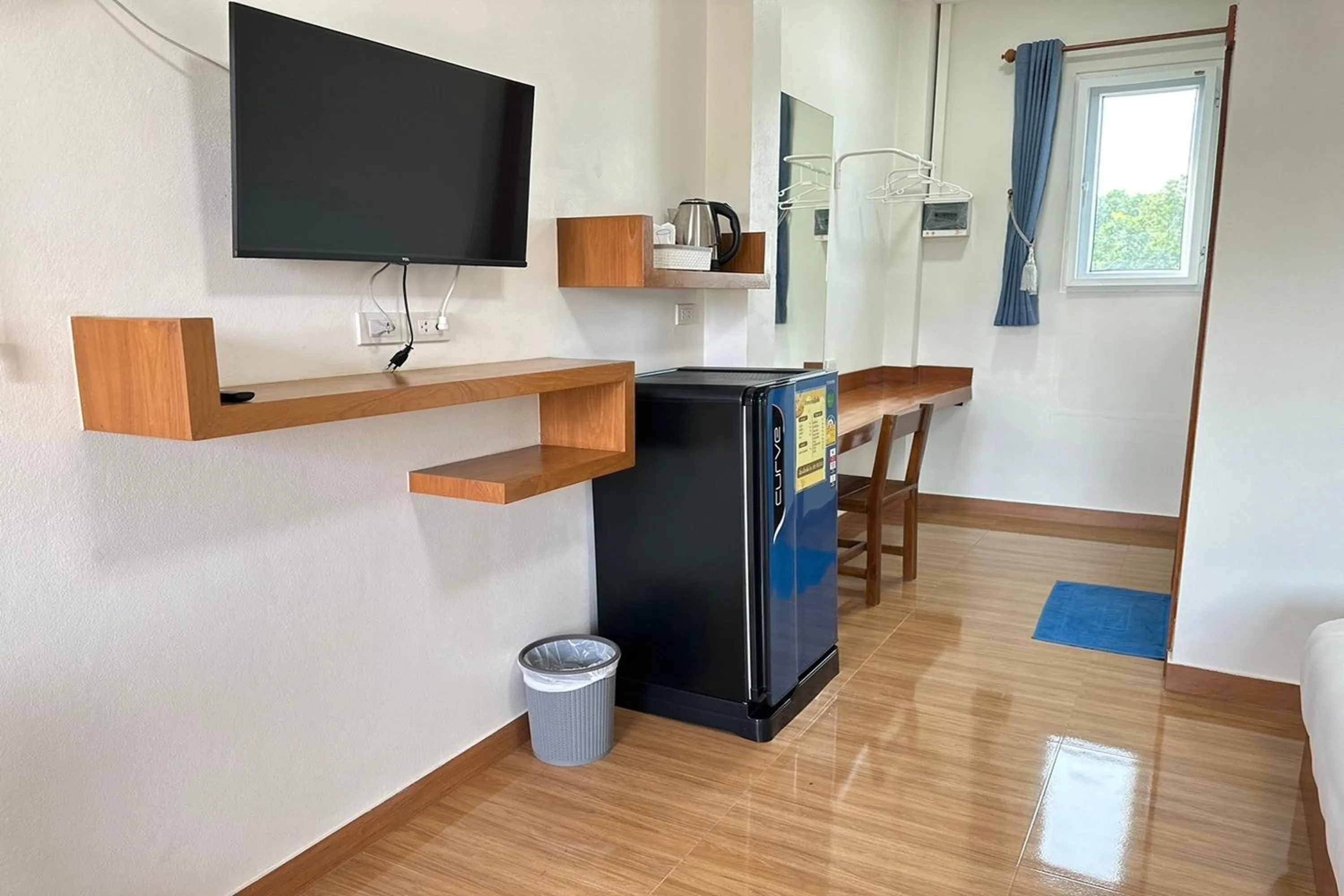 TV and multimedia in The White House P&N Hotel Chiang Rai