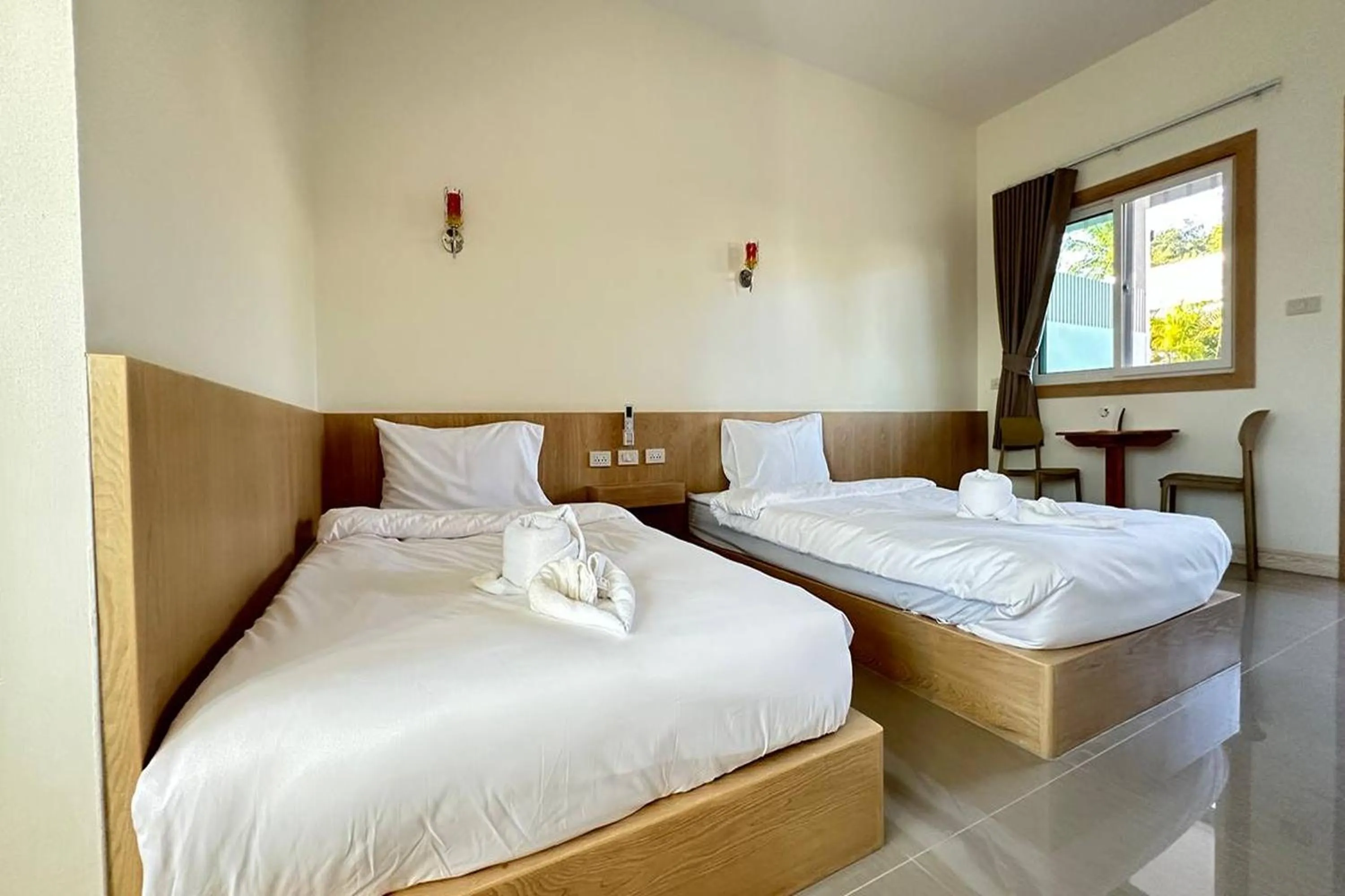 Bed in The White House P&N Hotel Chiang Rai